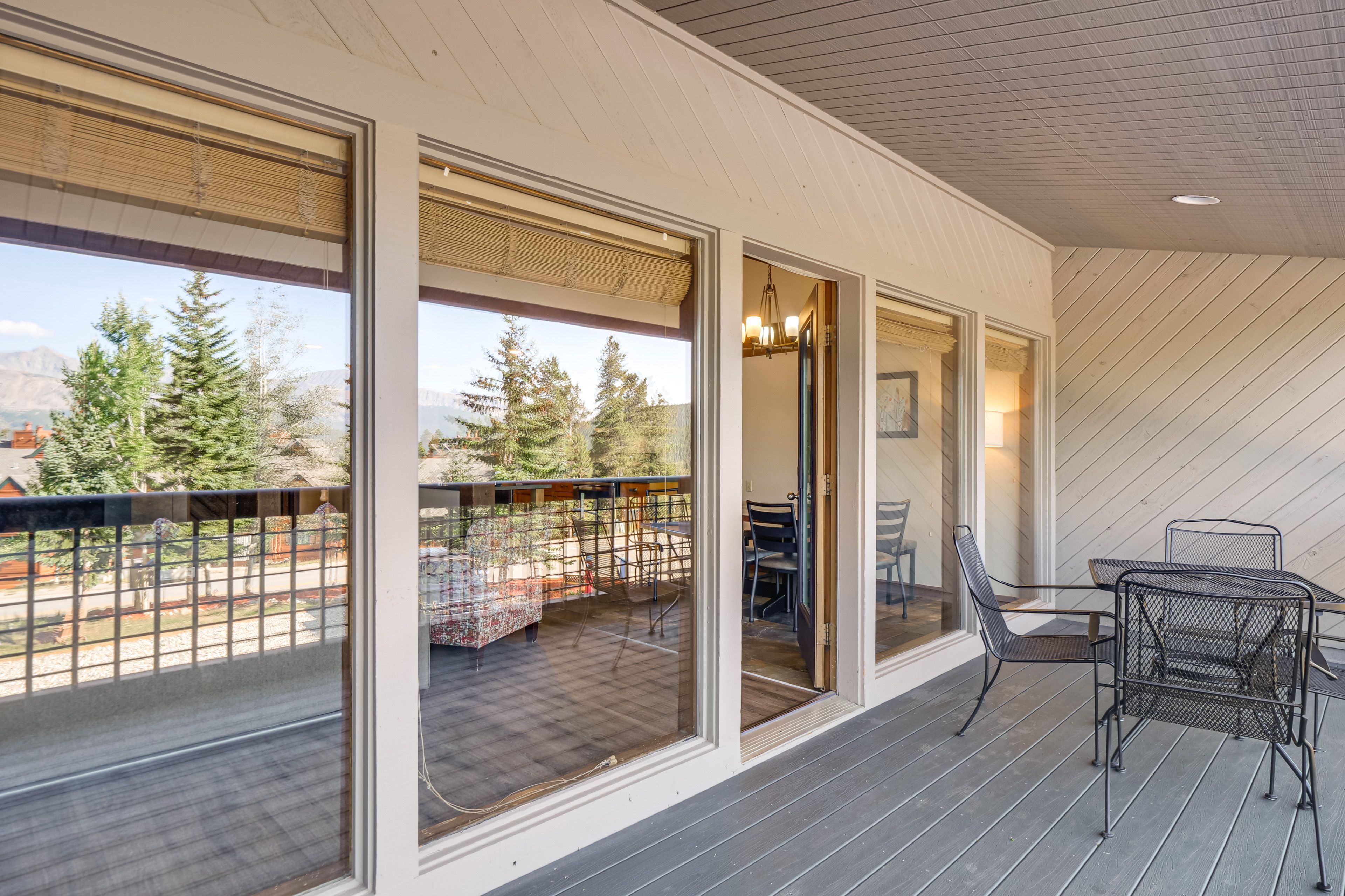 Covered Balcony | Dining Area | Mountain Views