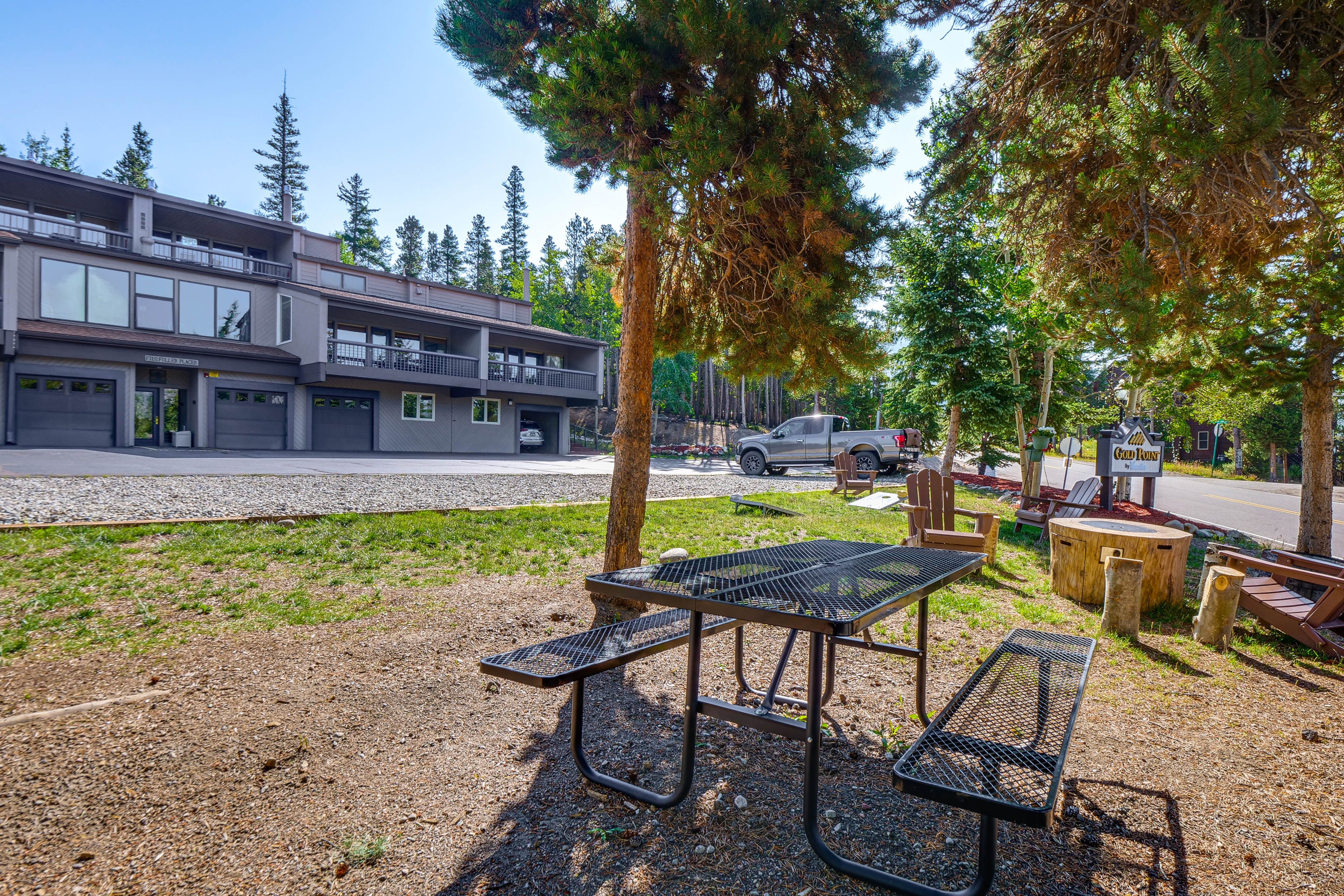 Townhouse Exterior | Garage (1 Vehicle) | Open Parking Lot (3 Vehicles)