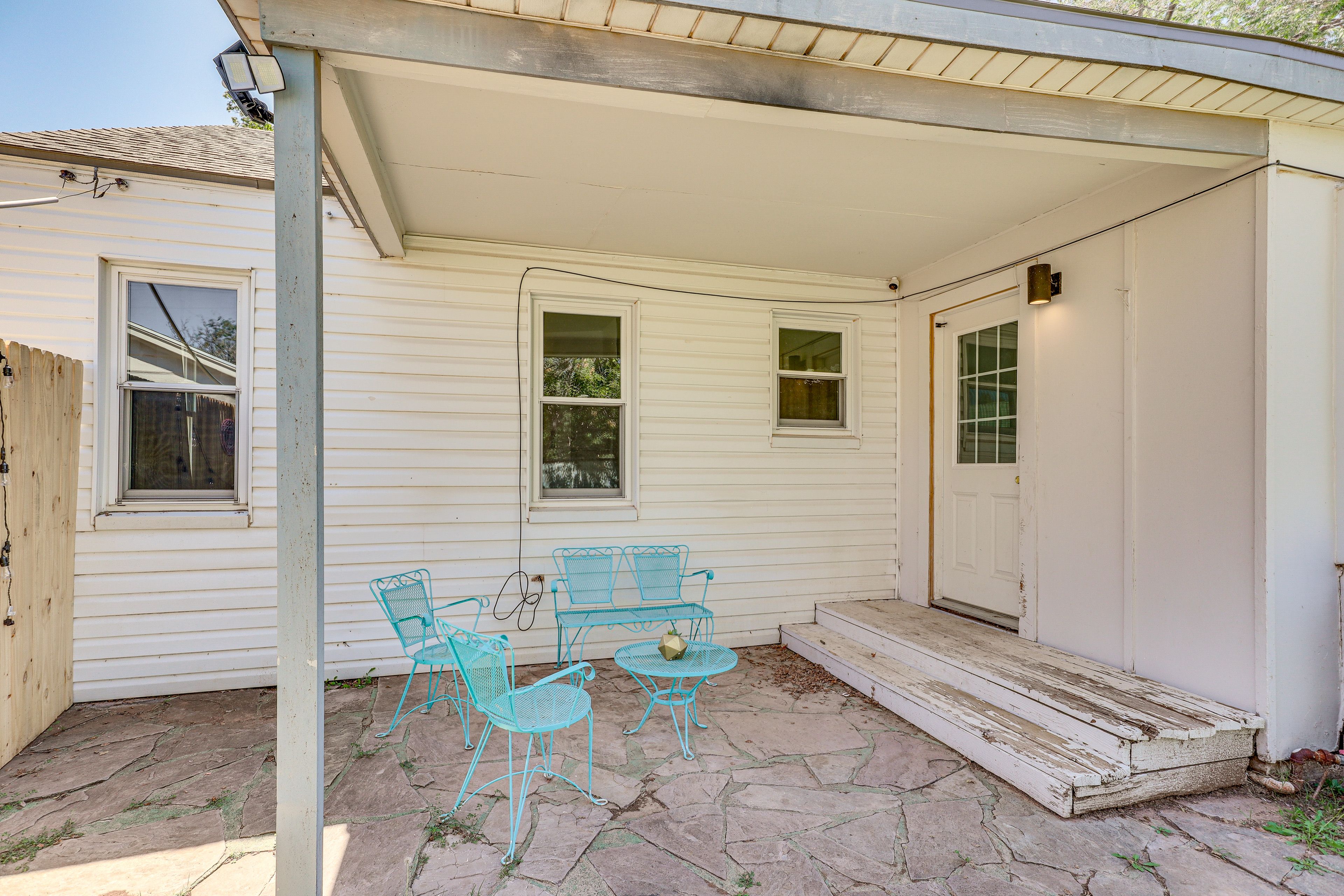 House Exterior | Covered Patio w/ Seating | Fenced Backyard