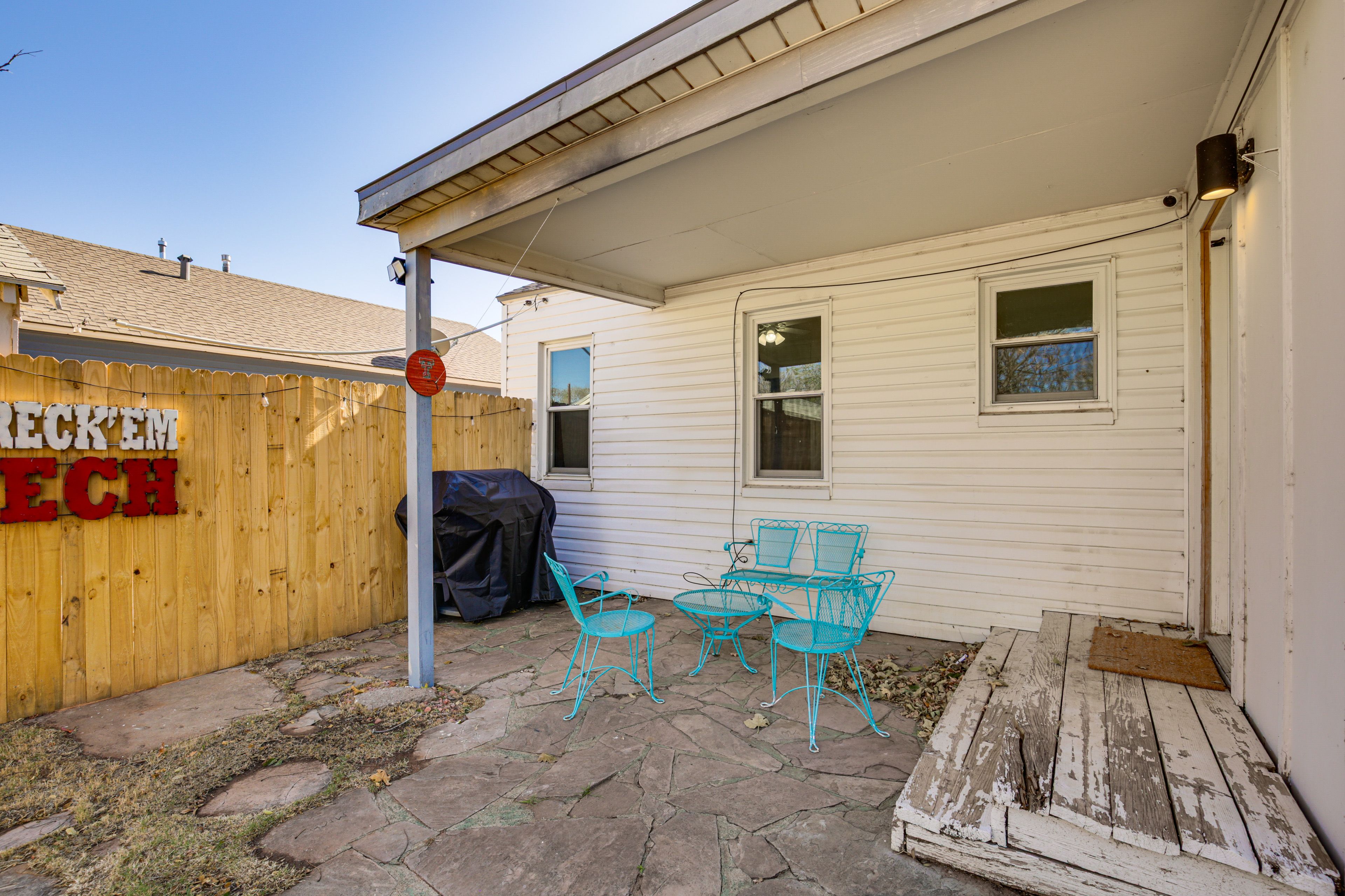 Covered Patio w/ Seating | Fenced Backyard