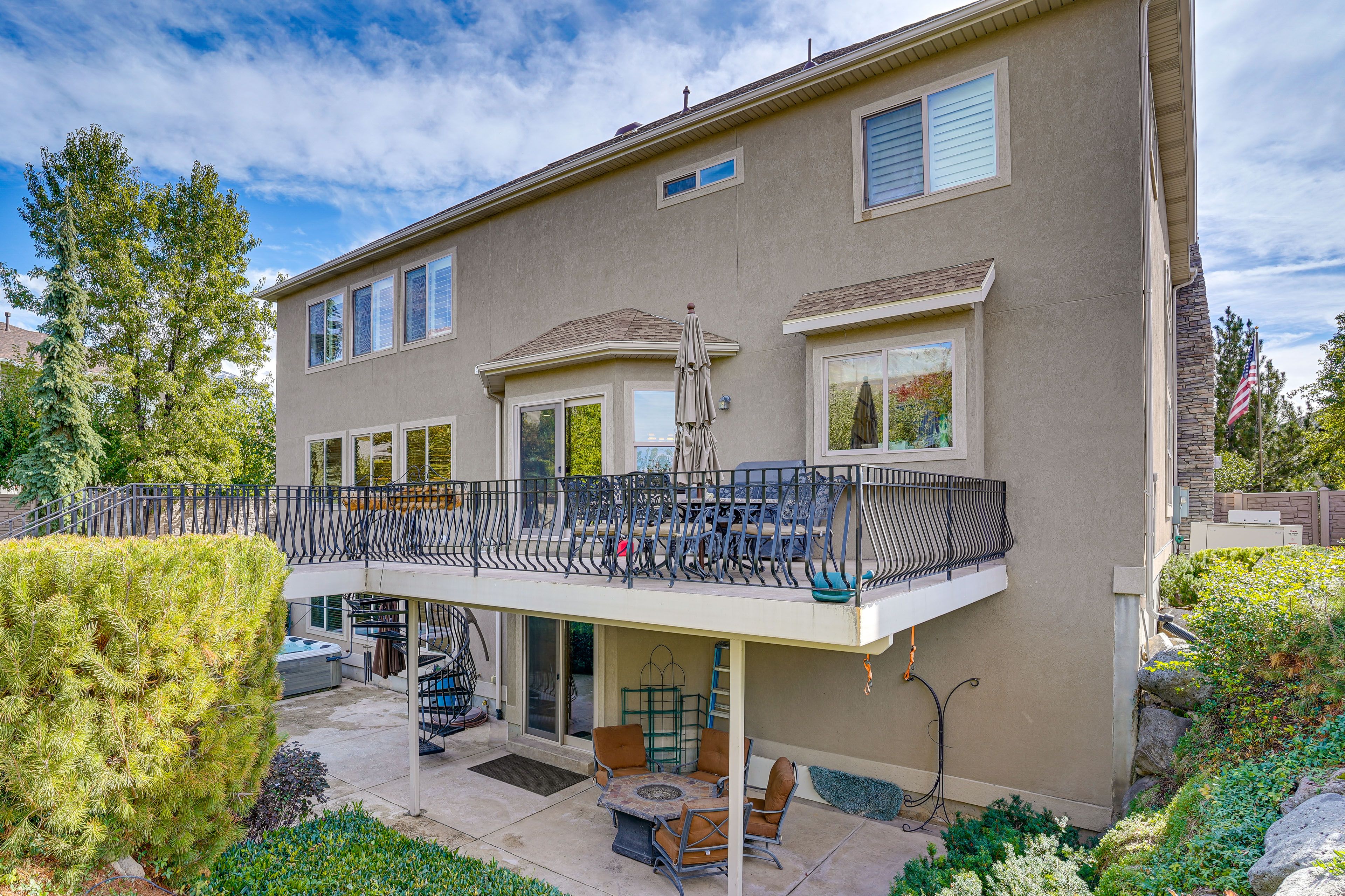 Property Exterior | Deck w/ Dining Area | Patio w/ Fire Pit