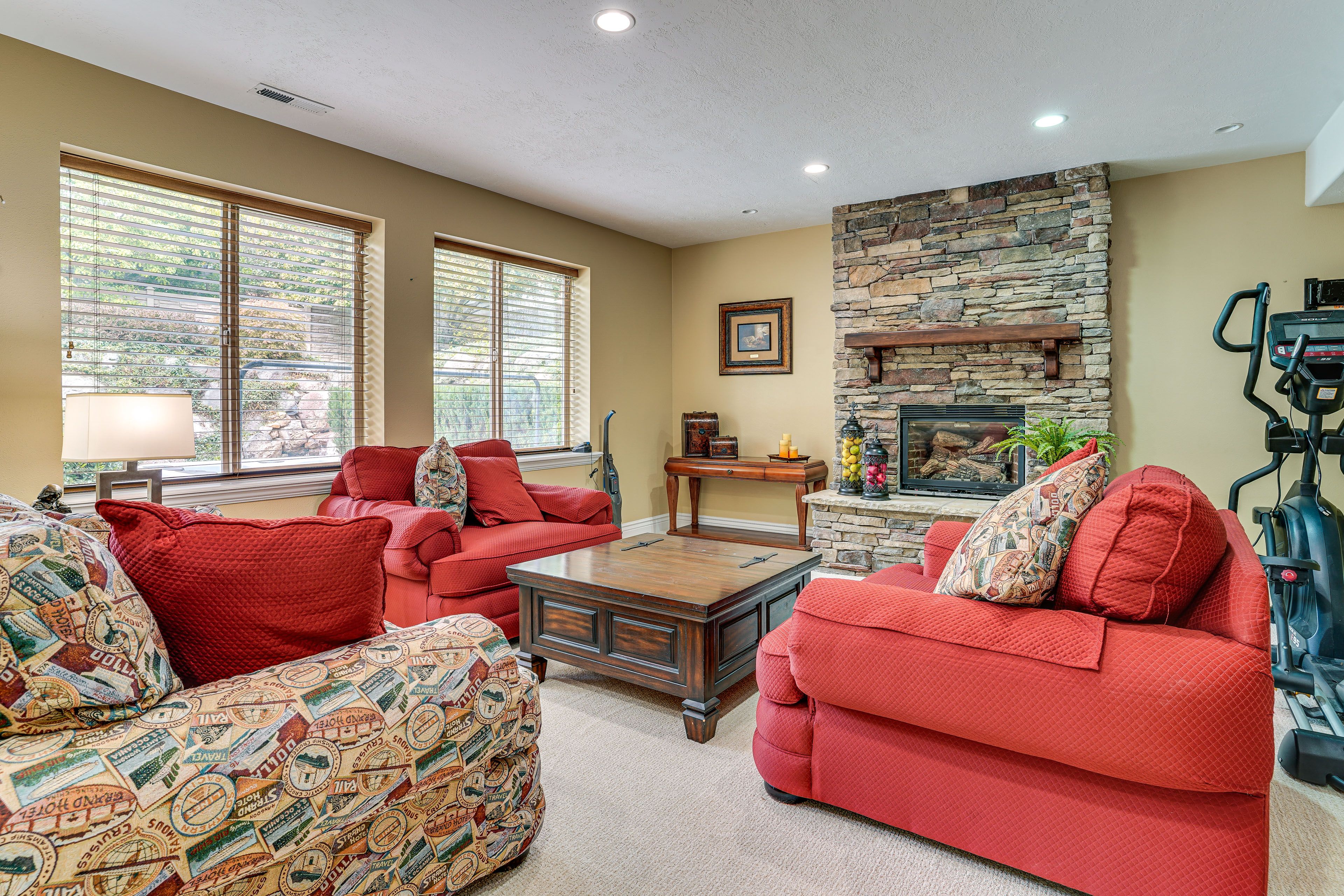 Family Room | Fireplace | Elliptical Machine | Pool Table | Lower Level