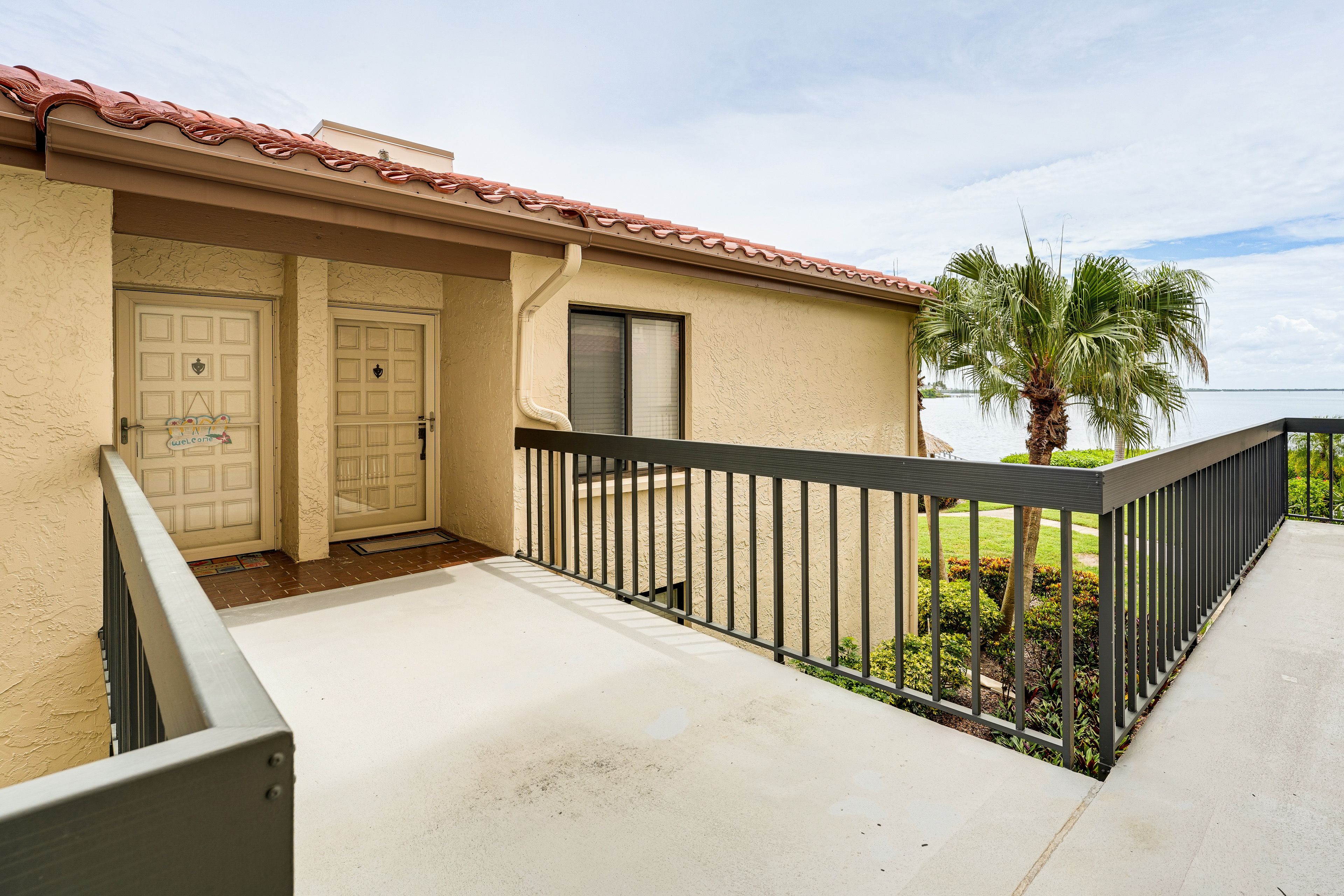 Property Exterior | Unit Entrance | Single-Story Condo