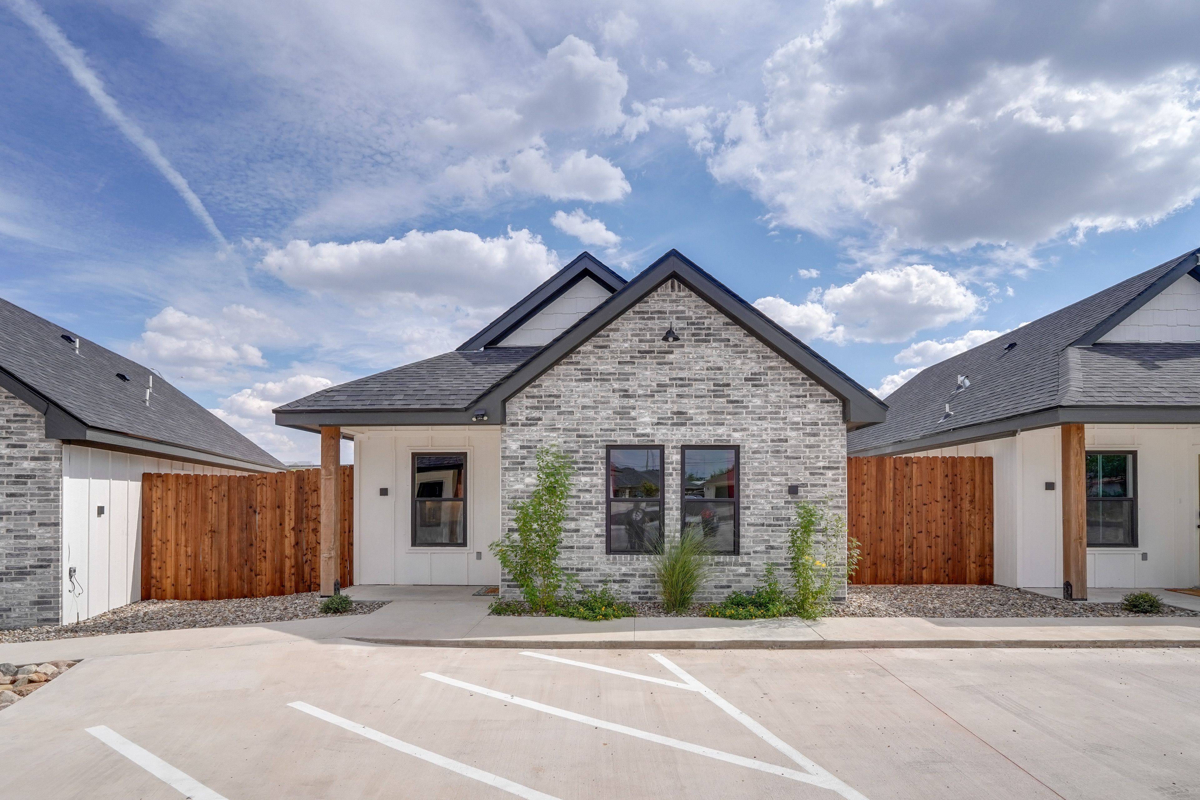 Parking | Open Community Lot (2 Vehicles) | Accessible Parking Available