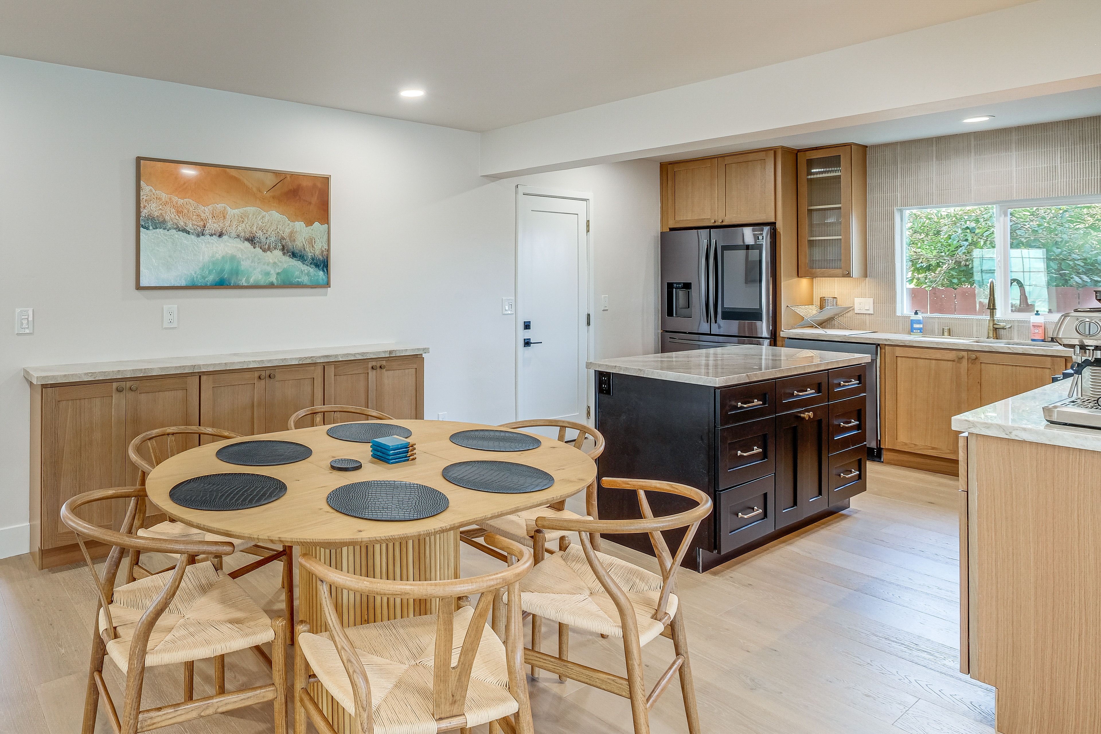 Kitchen & Dining Area | Central Heating & A/C | In-Unit Laundry