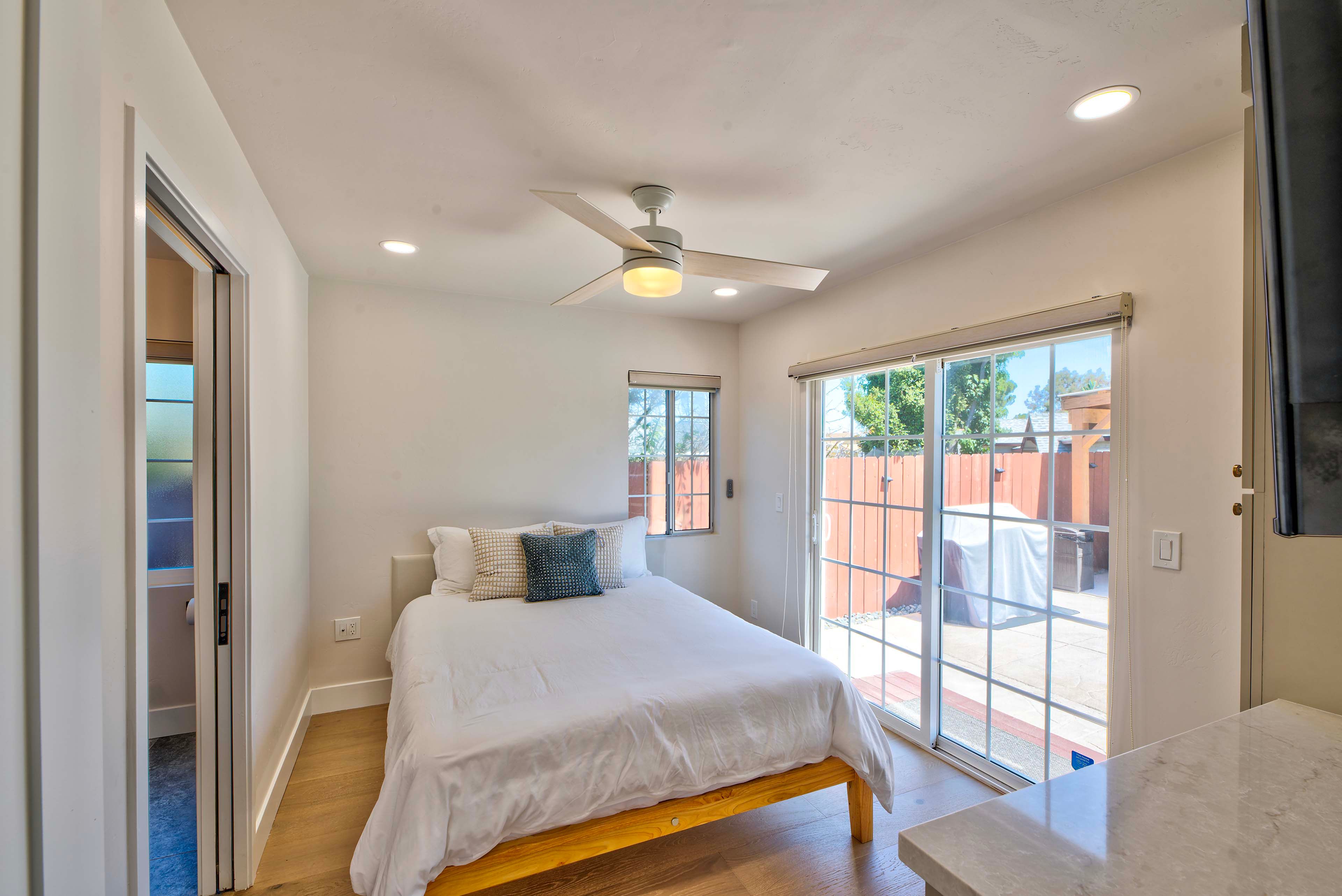 Bedroom 5 | 1st Floor | Queen Bed | Backyard Access | Smart TV