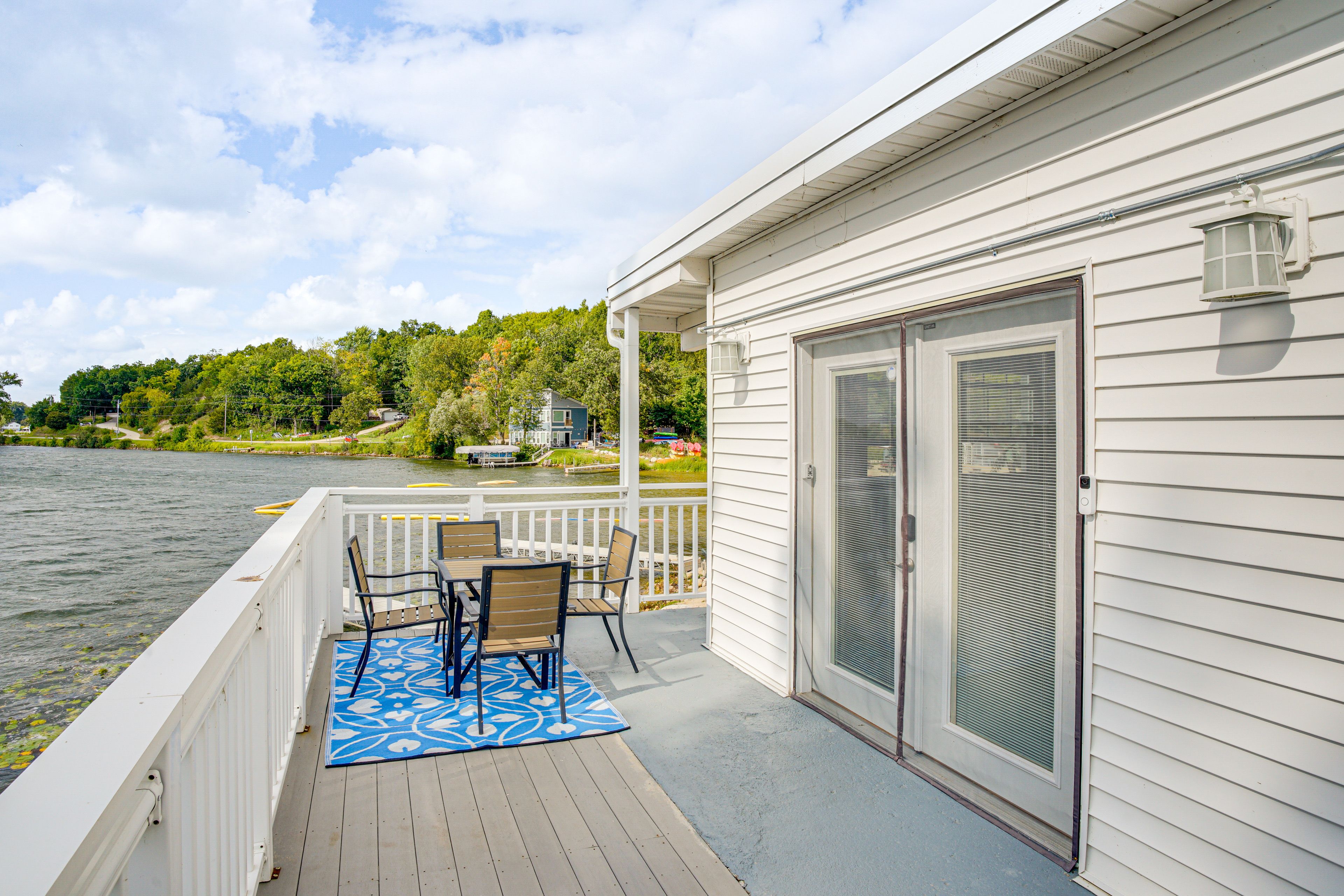 Condo Exterior | Private Deck w/ Dining Area | Beach & Lake Views