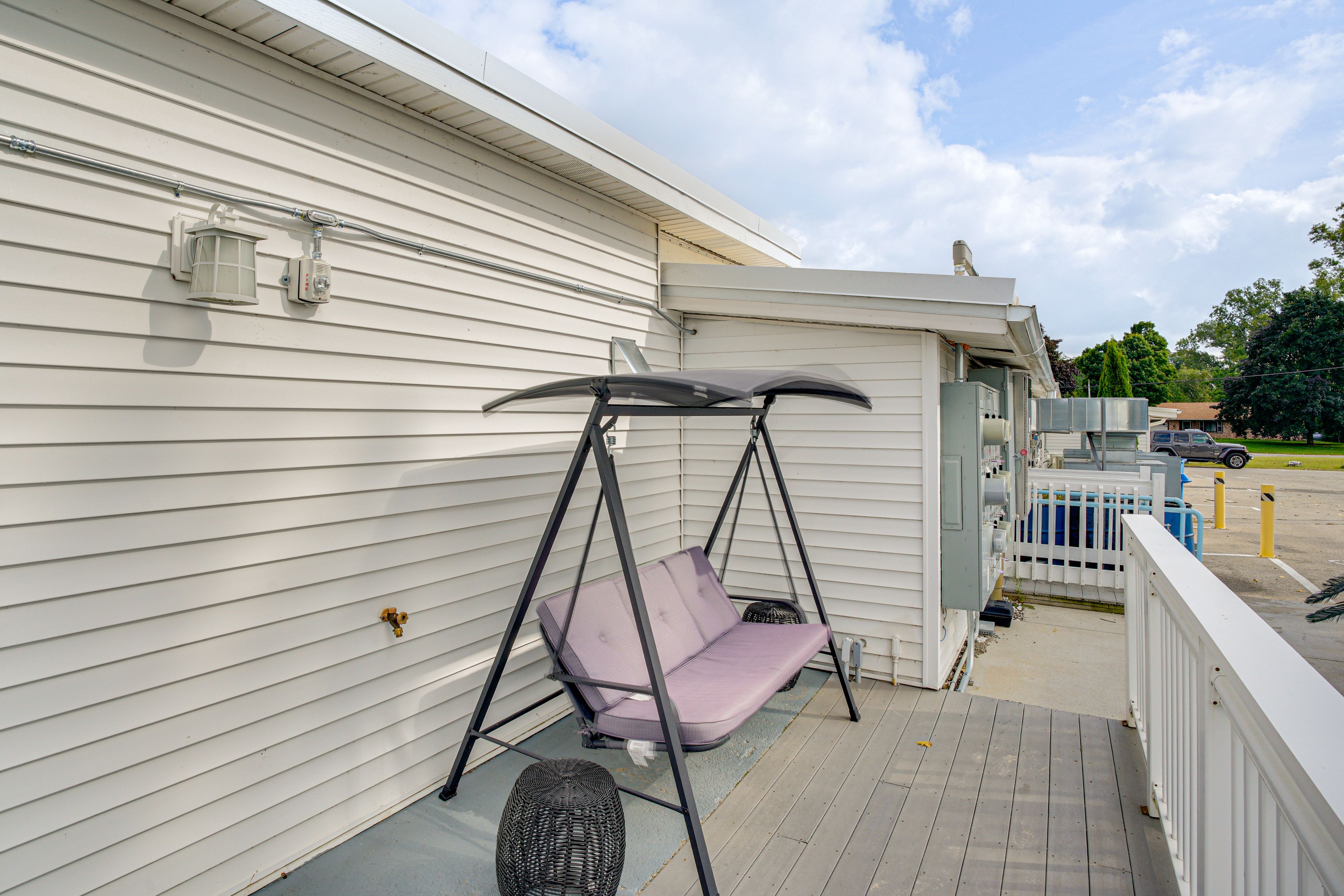 Condo Exterior | Private Deck w/ Seating