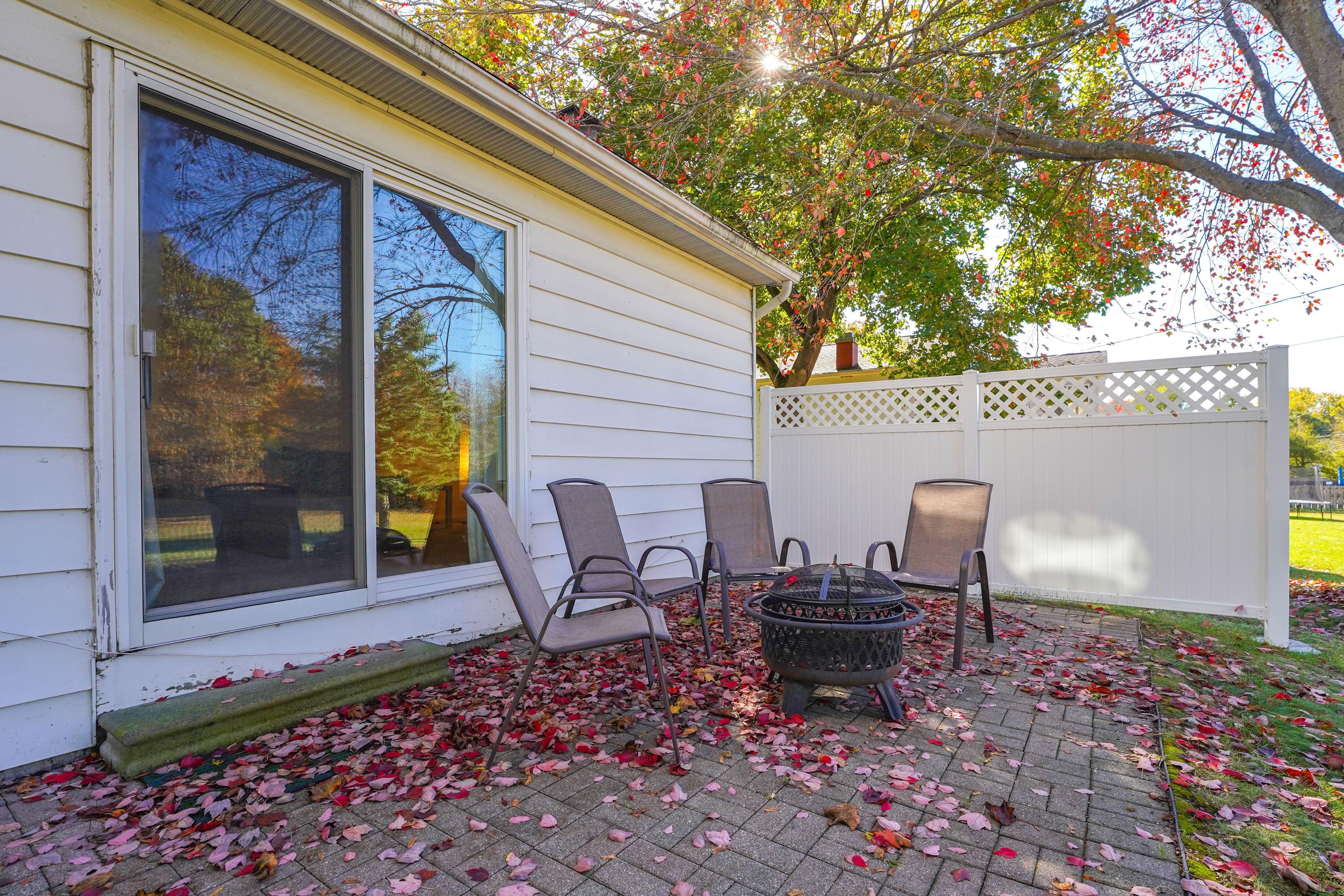 Property Exterior | Spacious Yard | Patio w/ Seating | Wood-Burning Fire Pit