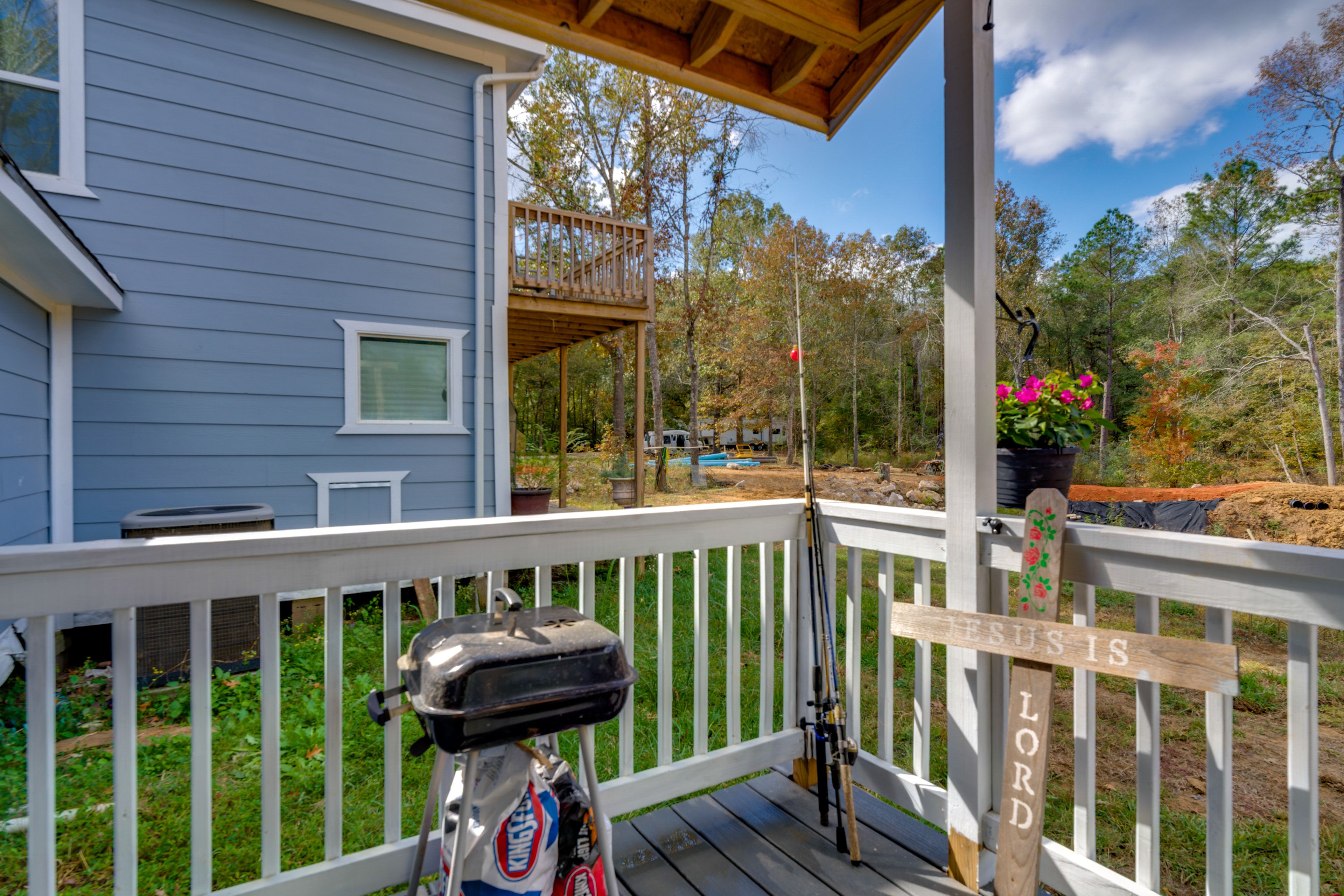 Studio Exterior | Covered Porch w/ Seating | Charcoal Grill | Smokeless Fire Pit