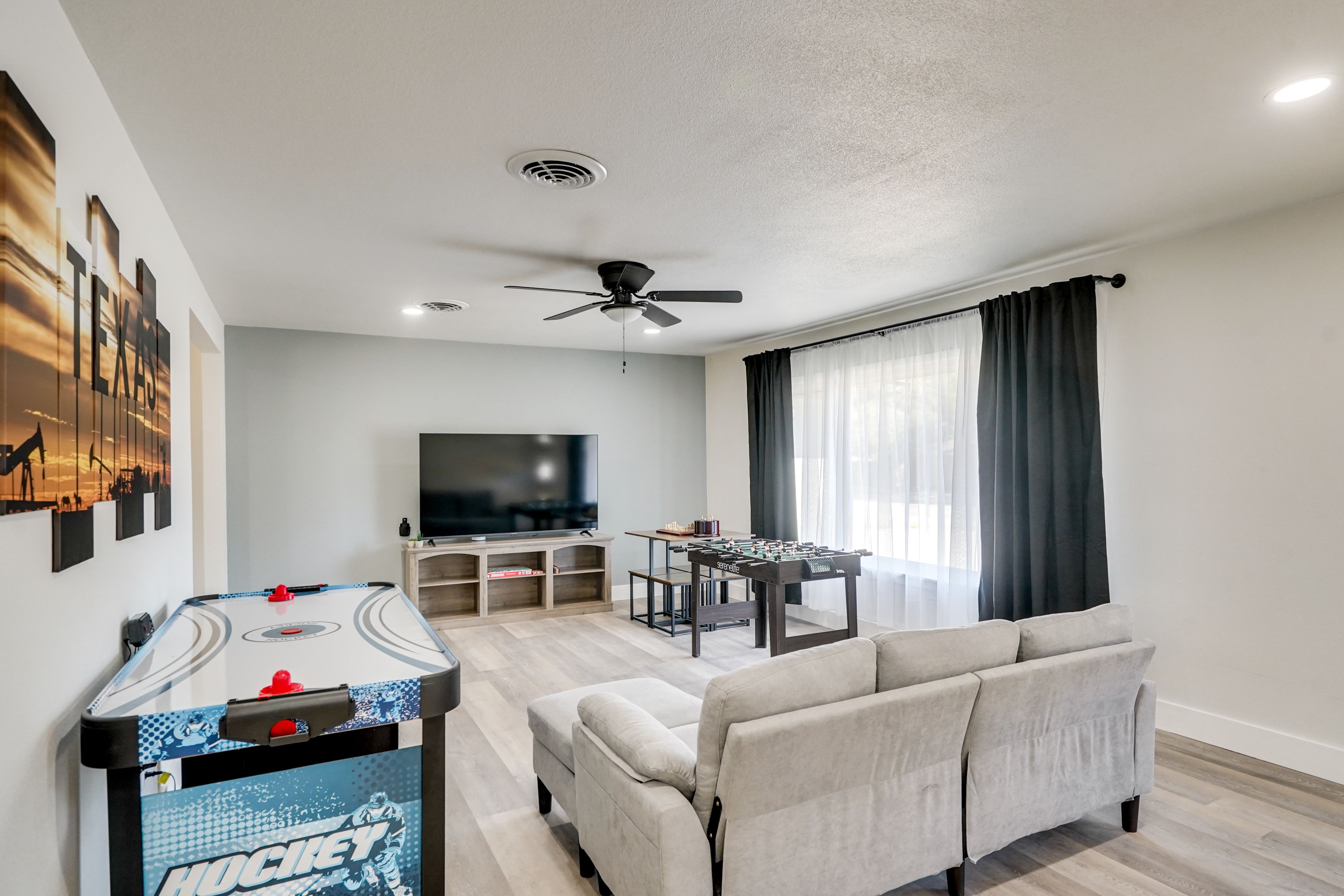 Game Room | 70" Smart TV | Air Hockey & Foosball Table | Board Games