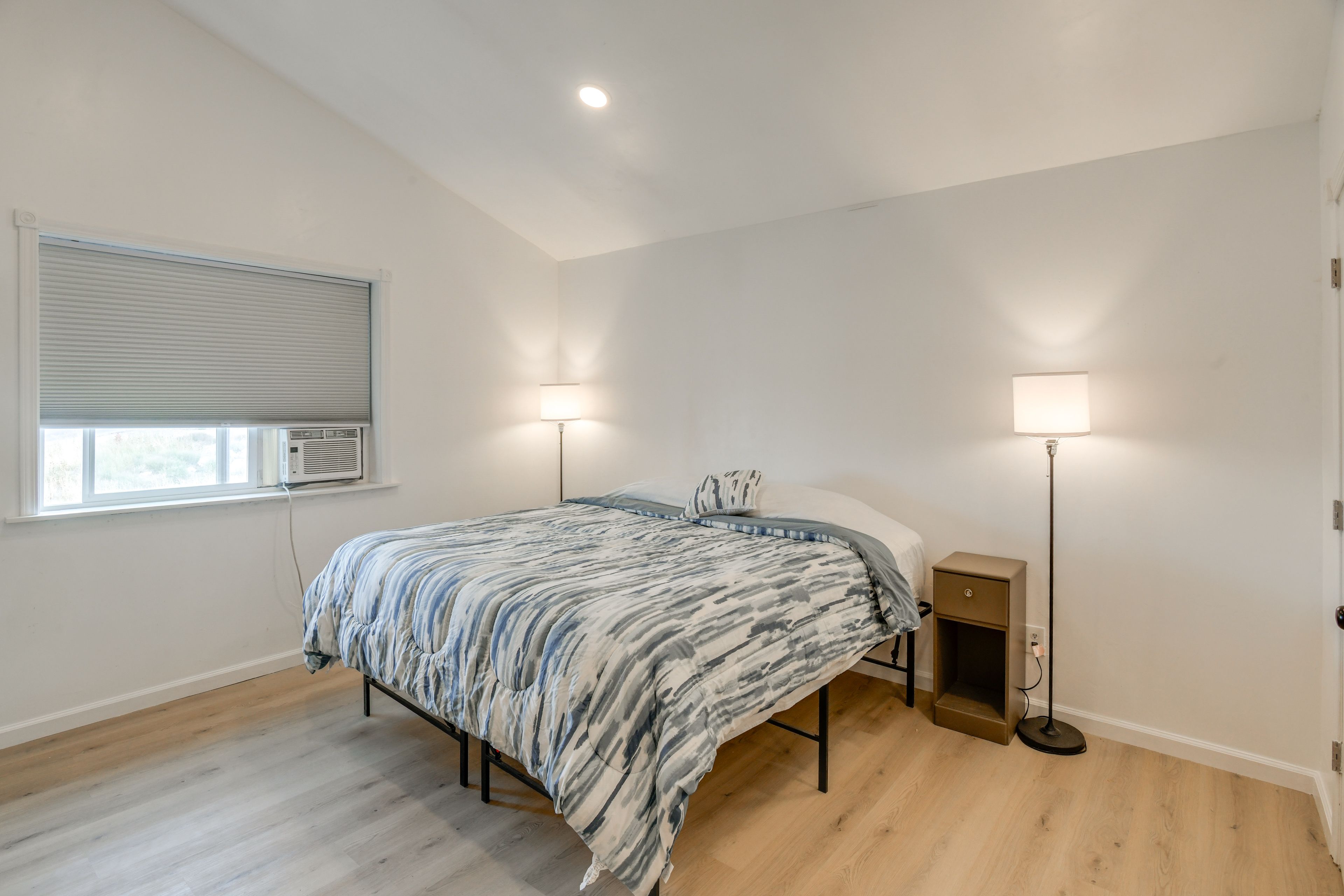 Bedroom 1 | King Bed | Linens Provided | Window A/C Unit