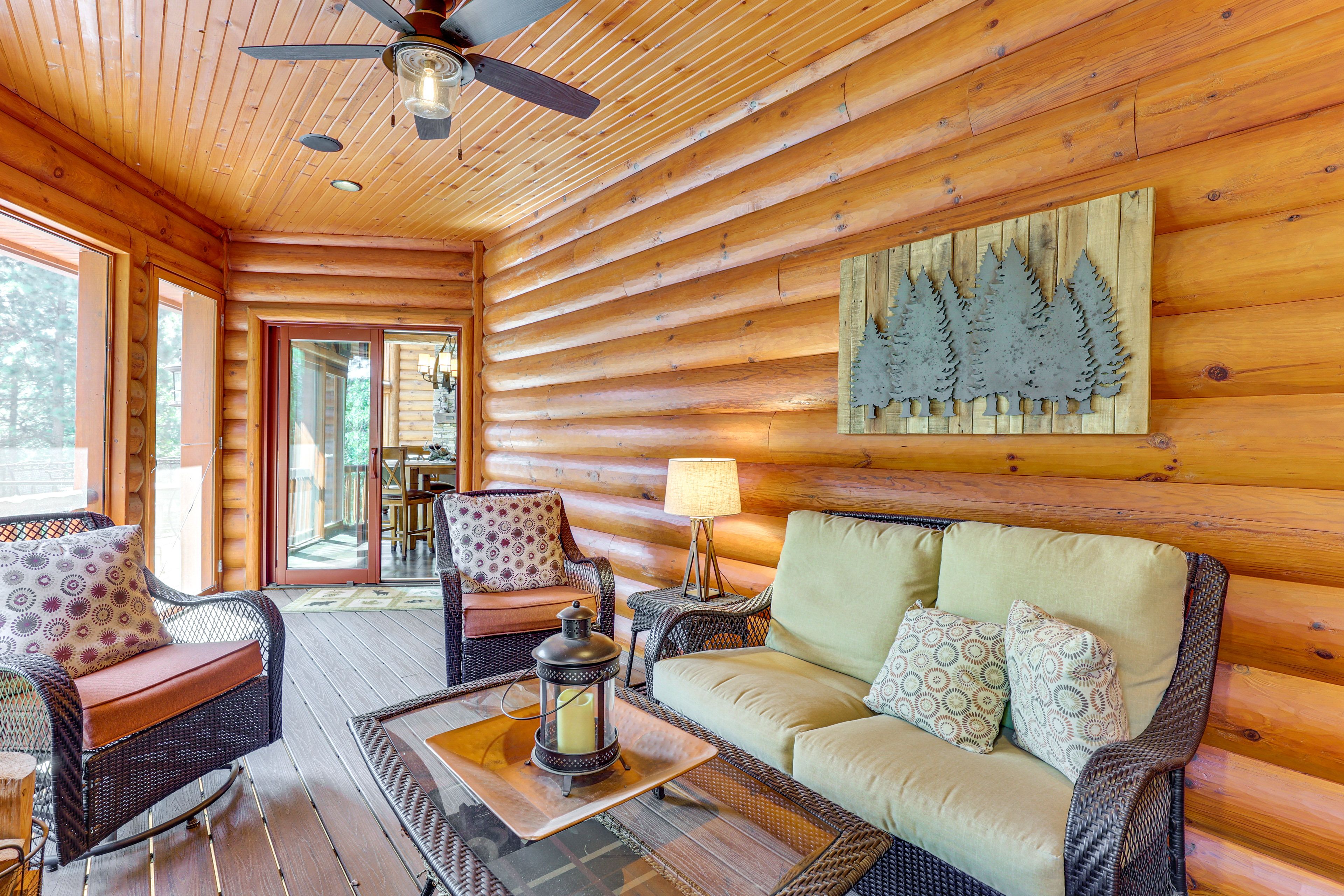 Cabin Exterior | Screened Sunroom | Wood-Burning Fireplace