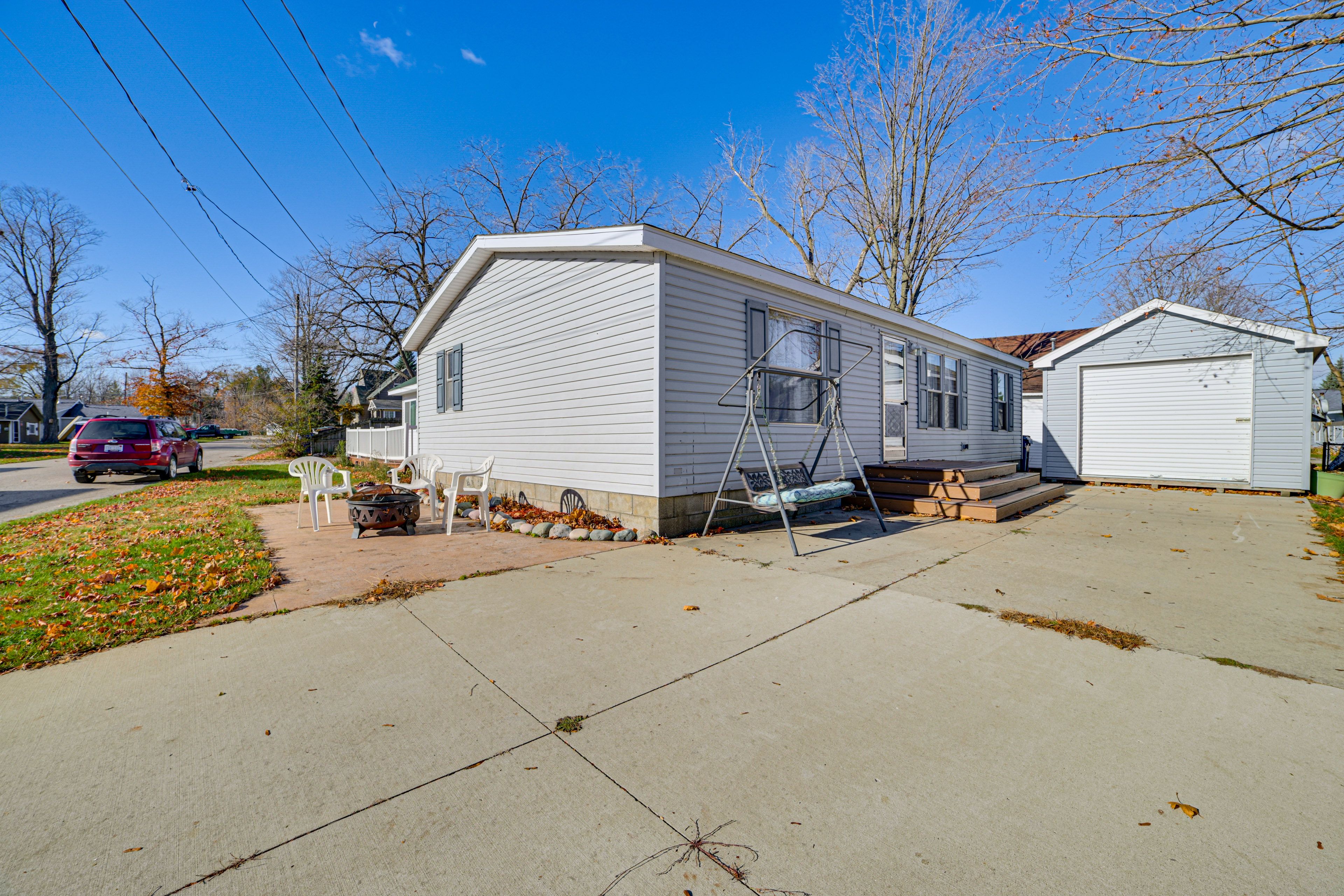 Exterior | Patio | Wood-Burning Fire Pit | Outdoor Swing