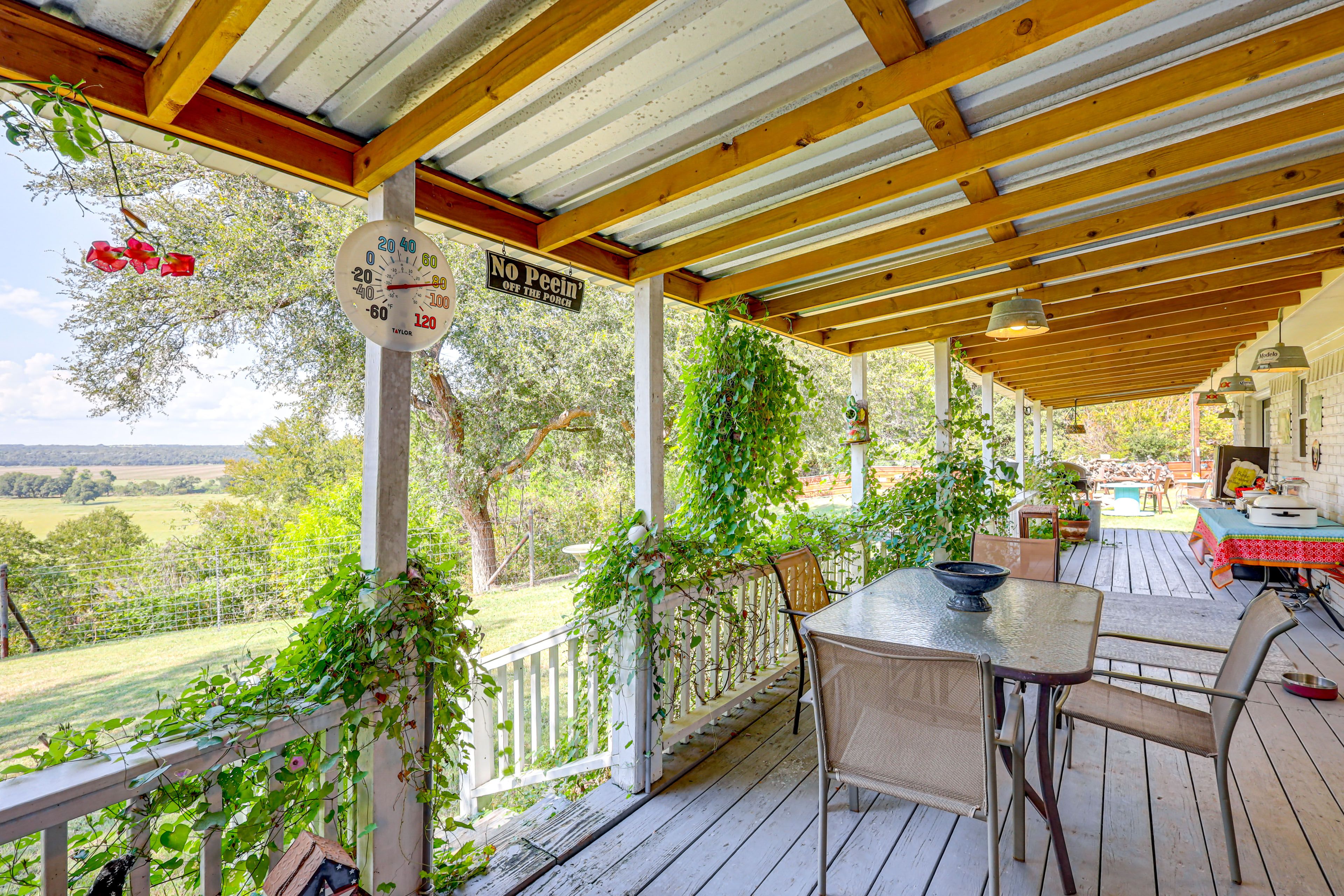 Covered Deck | Dining Area | Gas Grill (Propane Provided)