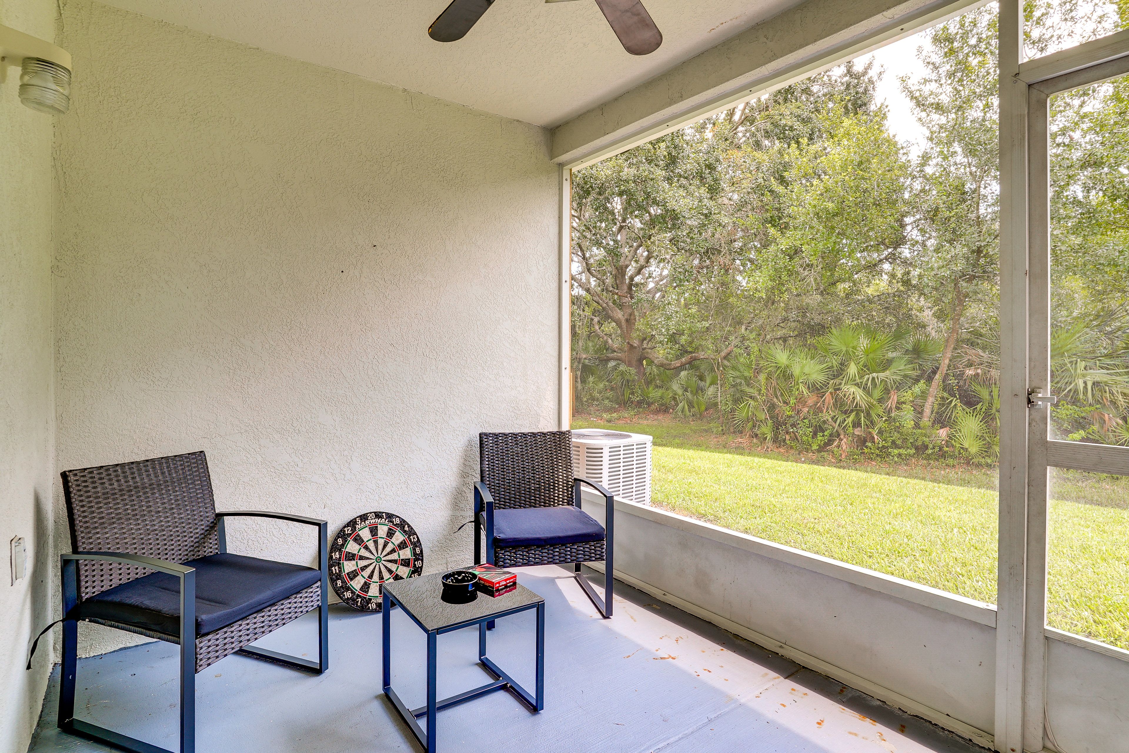 Townhome Exterior | Screened Patio | Dartboard