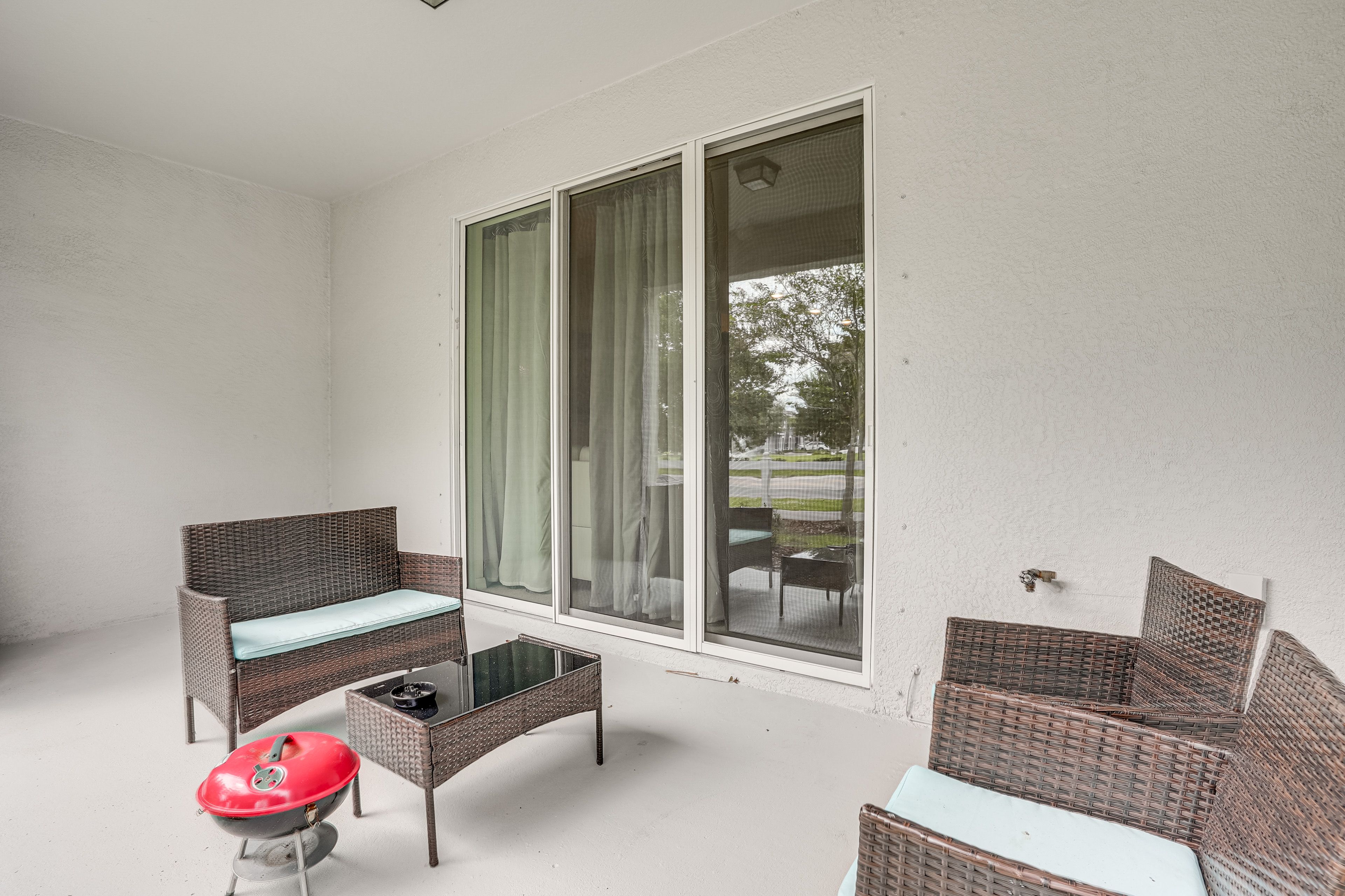 Covered Patio | Charcoal Grill | Lounge Seating