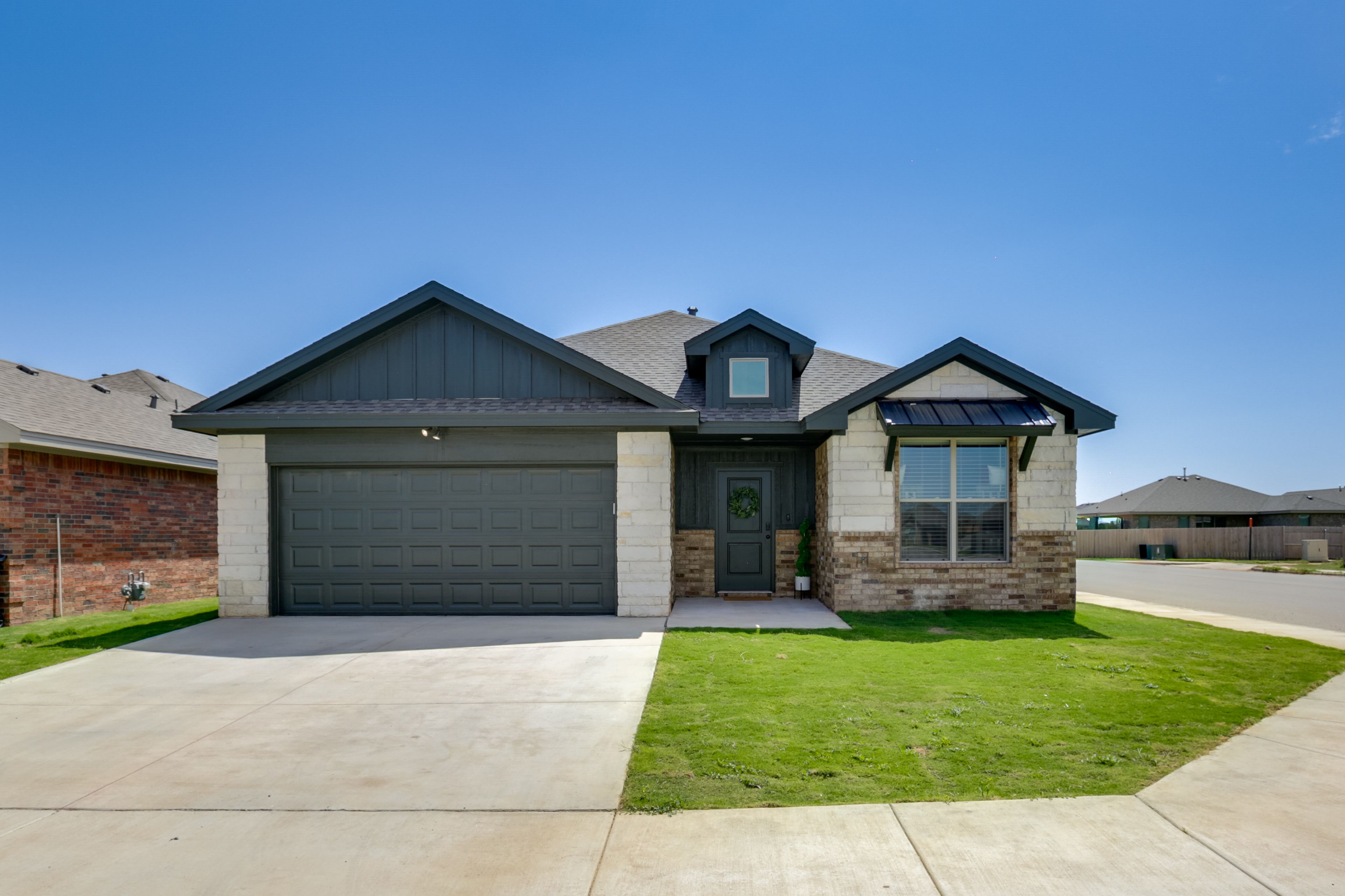 Exterior | Driveway (2 Vehicles) | Street Parking (4 Vehicles)