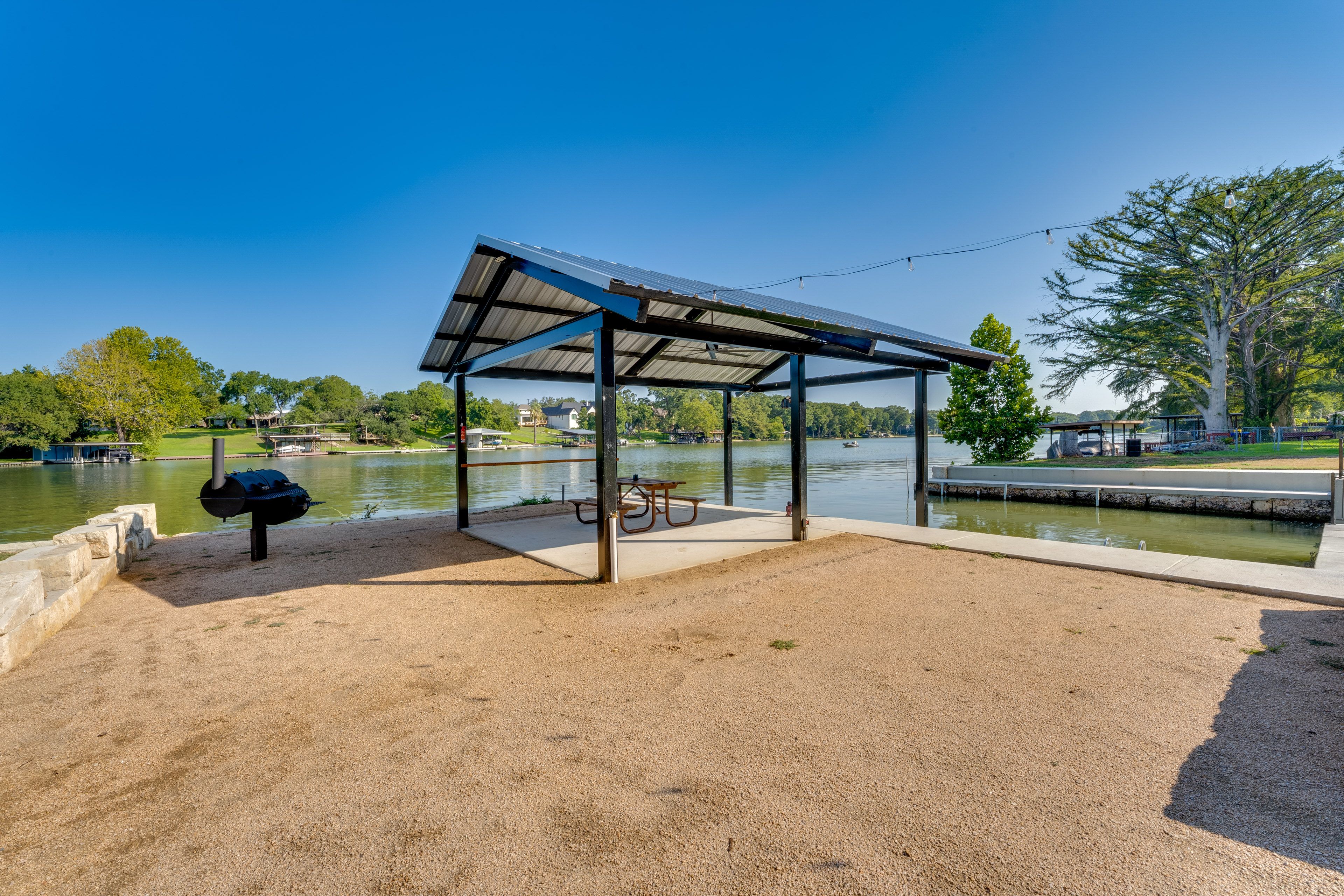 House Exterior | Pavilion w/ Dining Area | Charcoal Grill/Smoker | Boat Slip