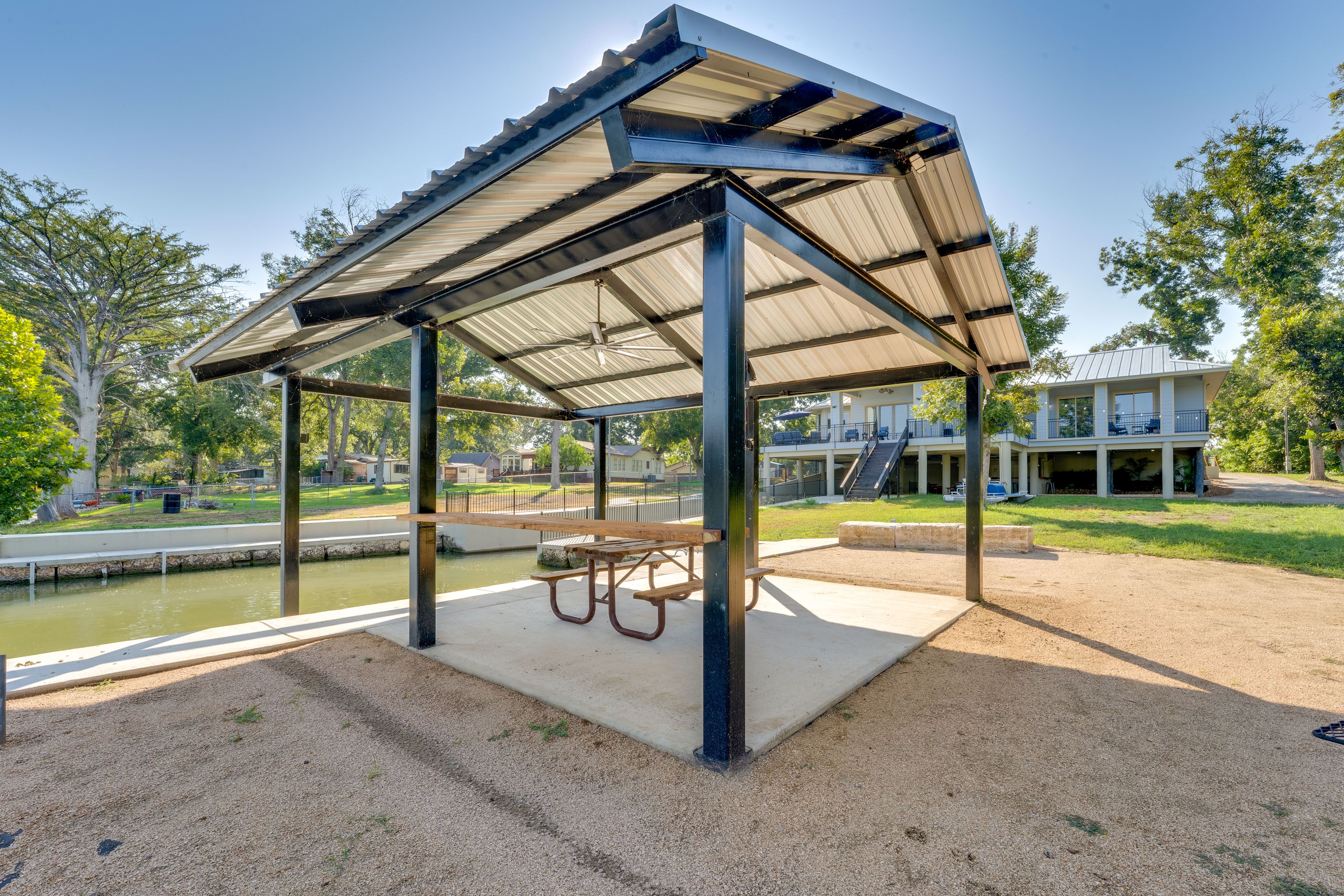 House Exterior | Pavilion w/ Dining Area | Charcoal Grill/Smoker | Boat Slip