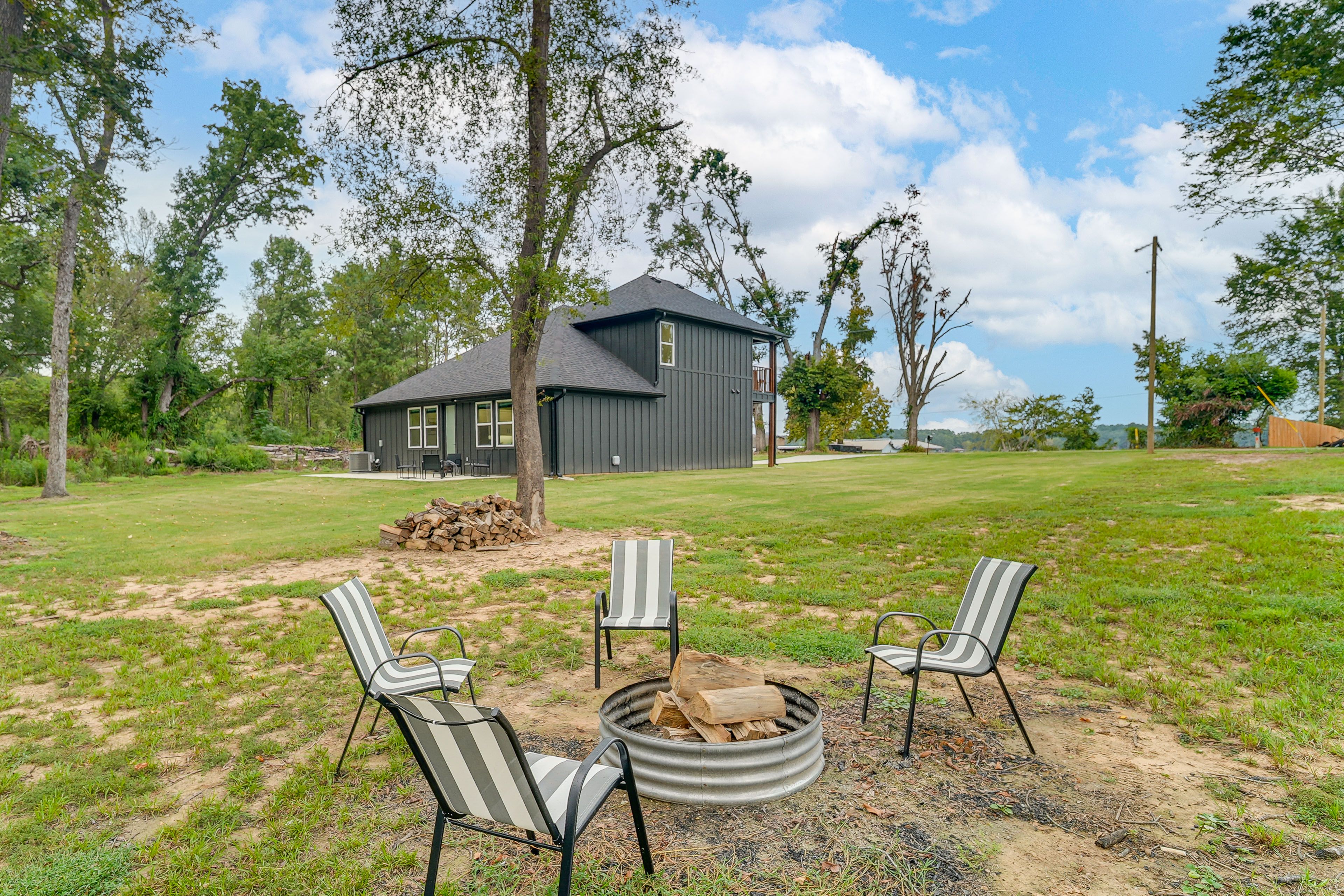 Spacious Yard | Lake Views | Charcoal Grill | Wood-Burning Fire Pit