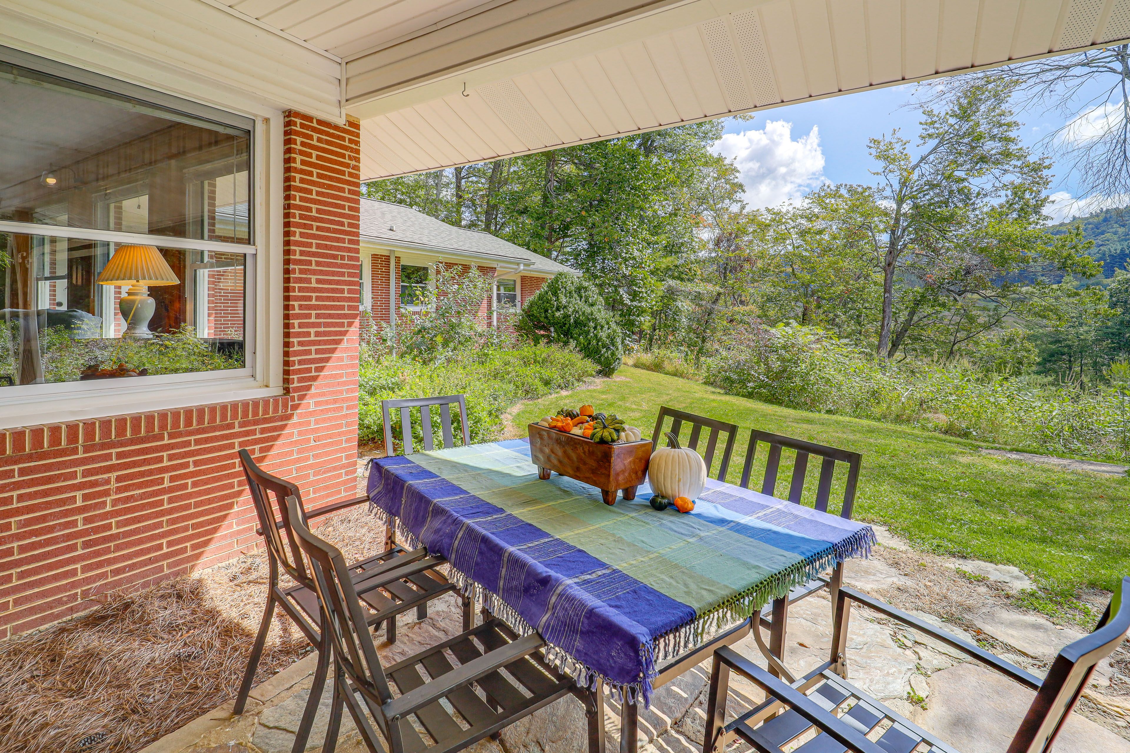 House Exterior | Covered Patio w/ Dining Area | Mountain Views