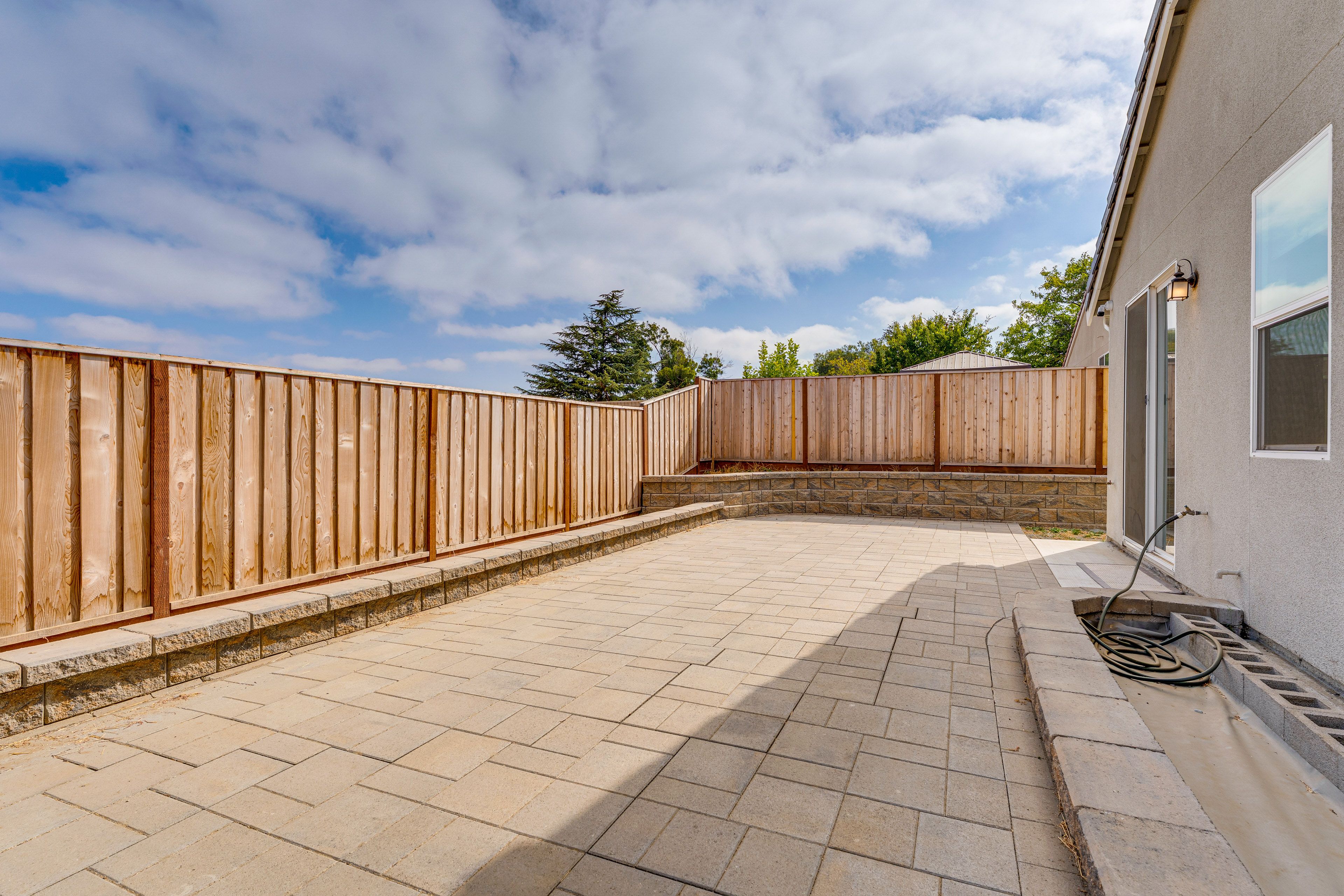 Property Exterior | Fenced-In Patio