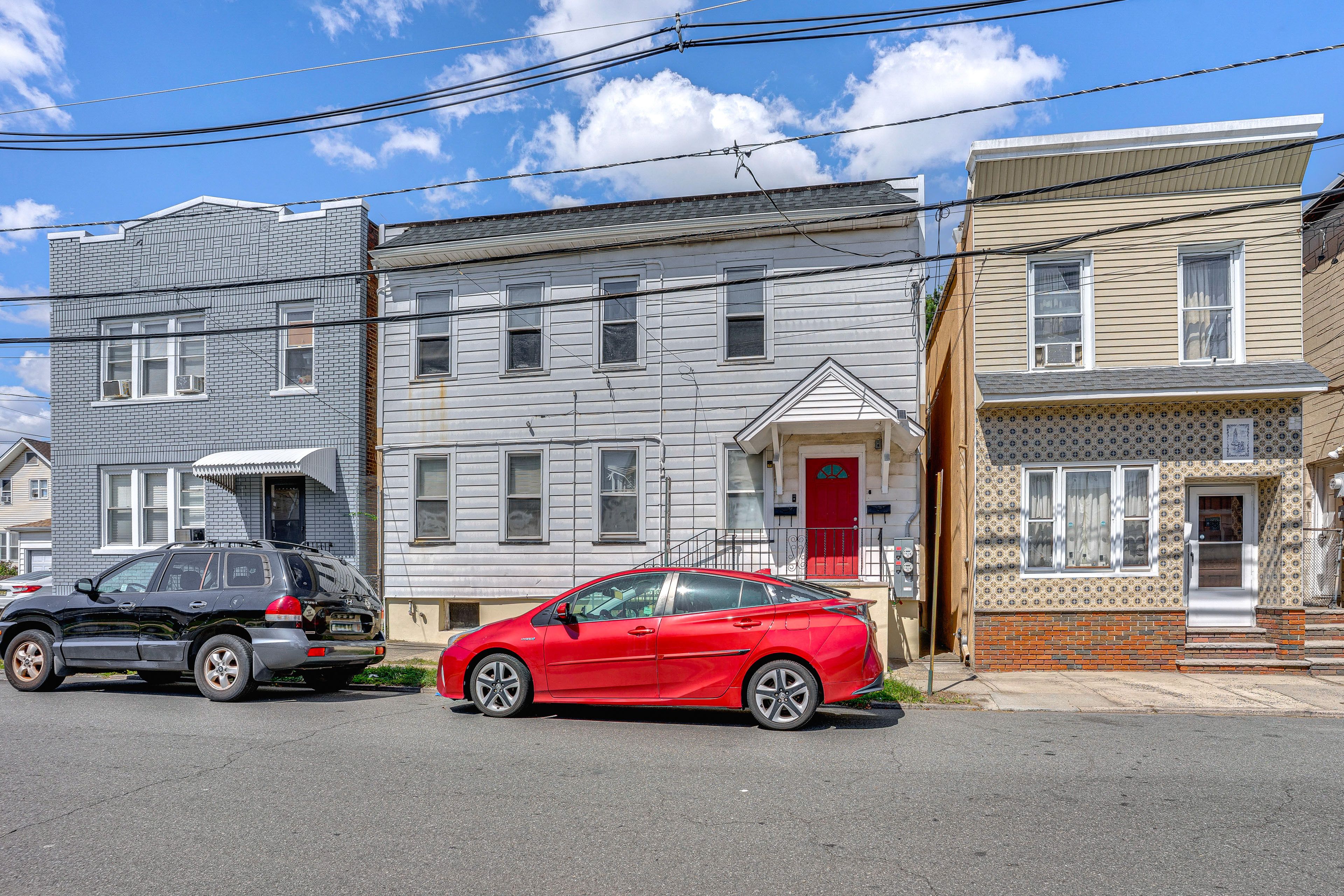 Building Exterior | Free Street Parking (First-Come, First-Served)