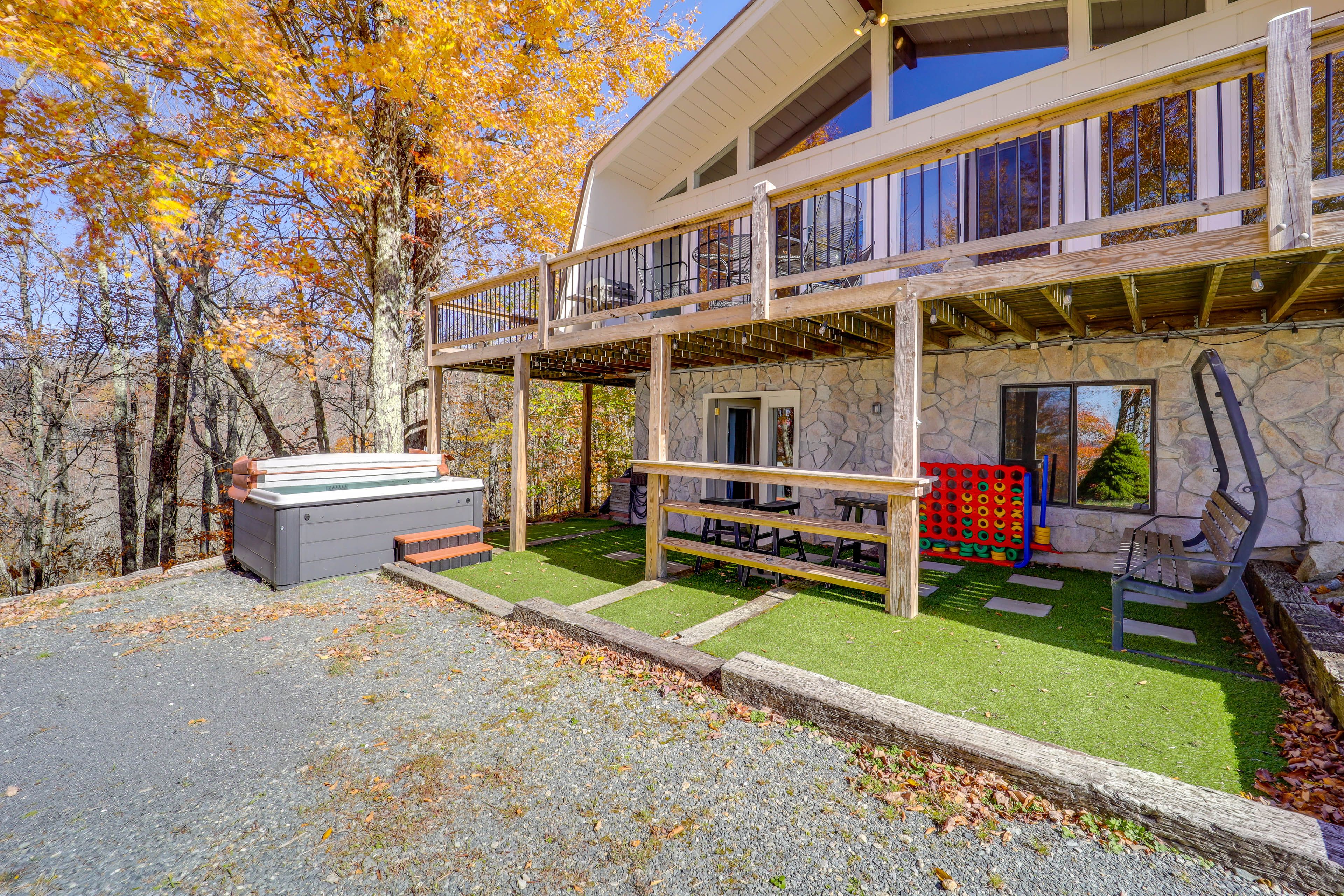 Patio | Seating | Jumbo Connect 4 | Private Hot Tub