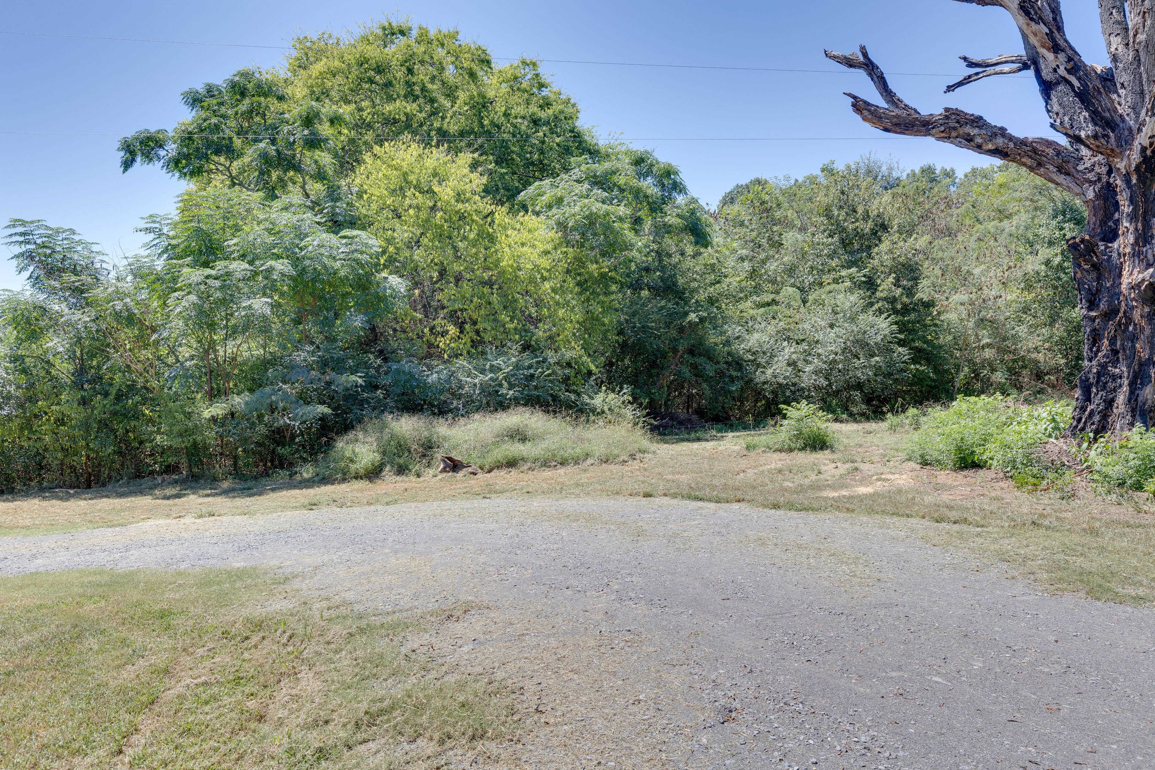 Parking | Driveway (2 Vehicles) | Boat Trailer Parking Allowed On-Site
