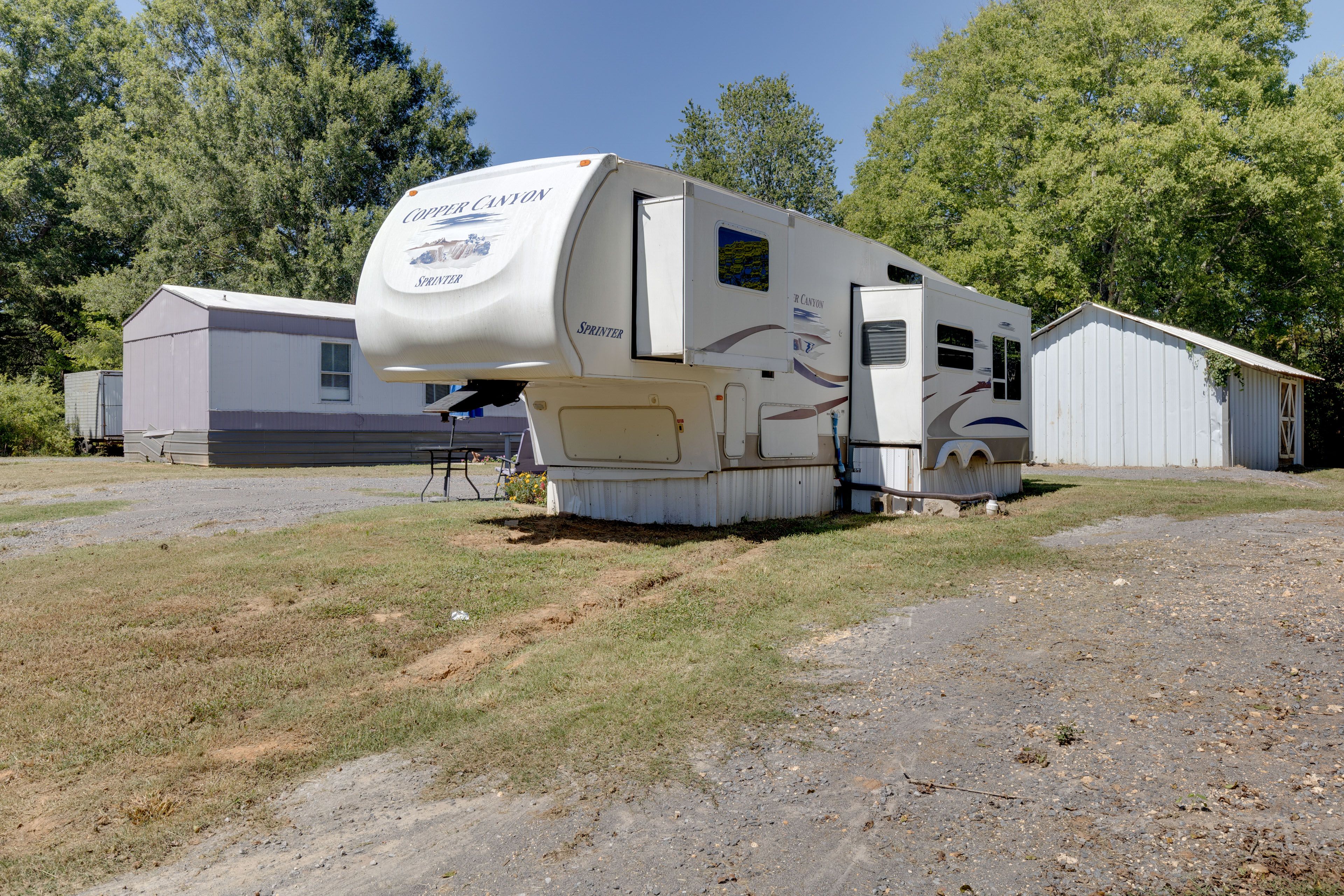Parking | Driveway (2 Vehicles) | Boat Trailer Parking Allowed On-Site