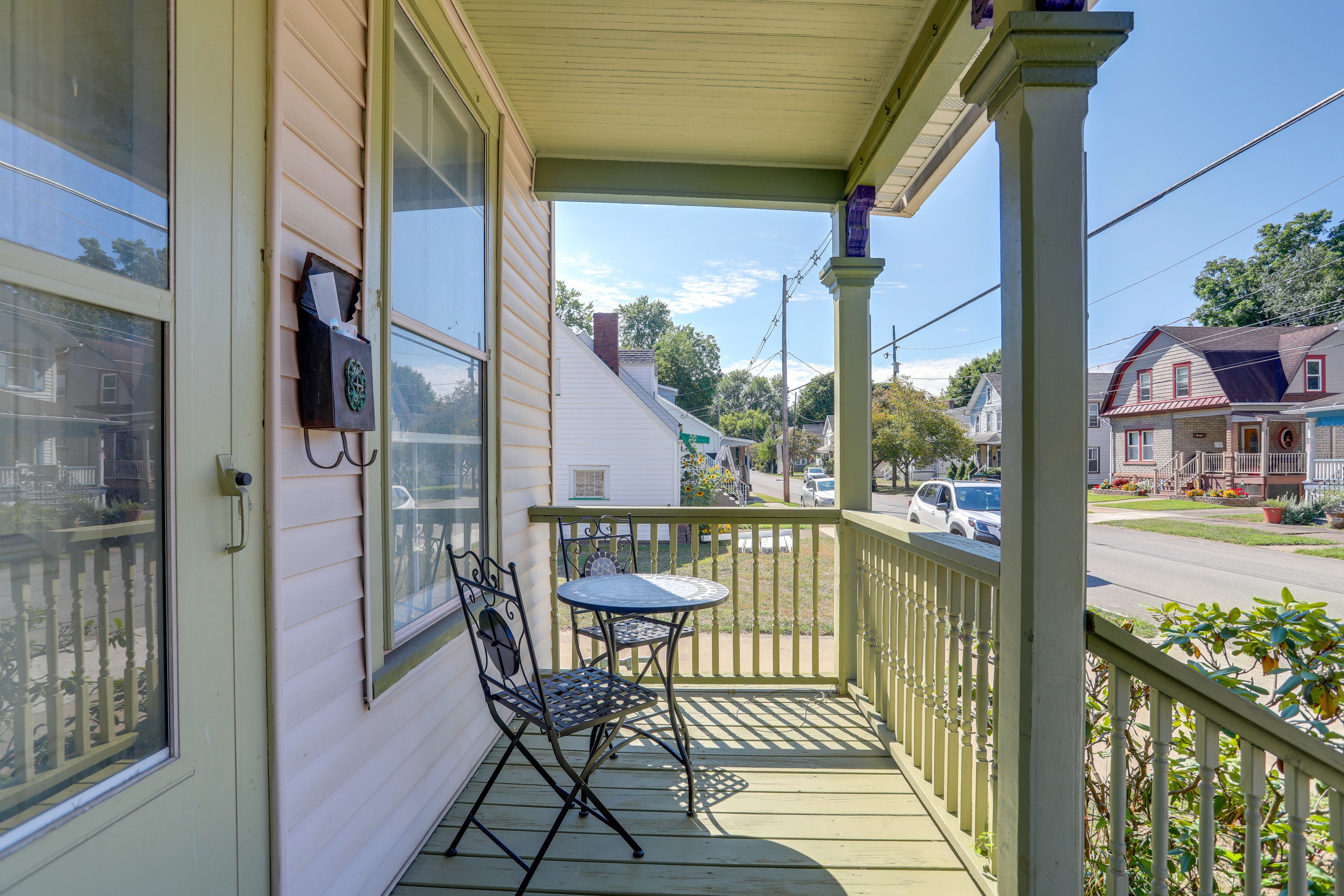 Covered Porch | Bistro Table | Rocking Chair