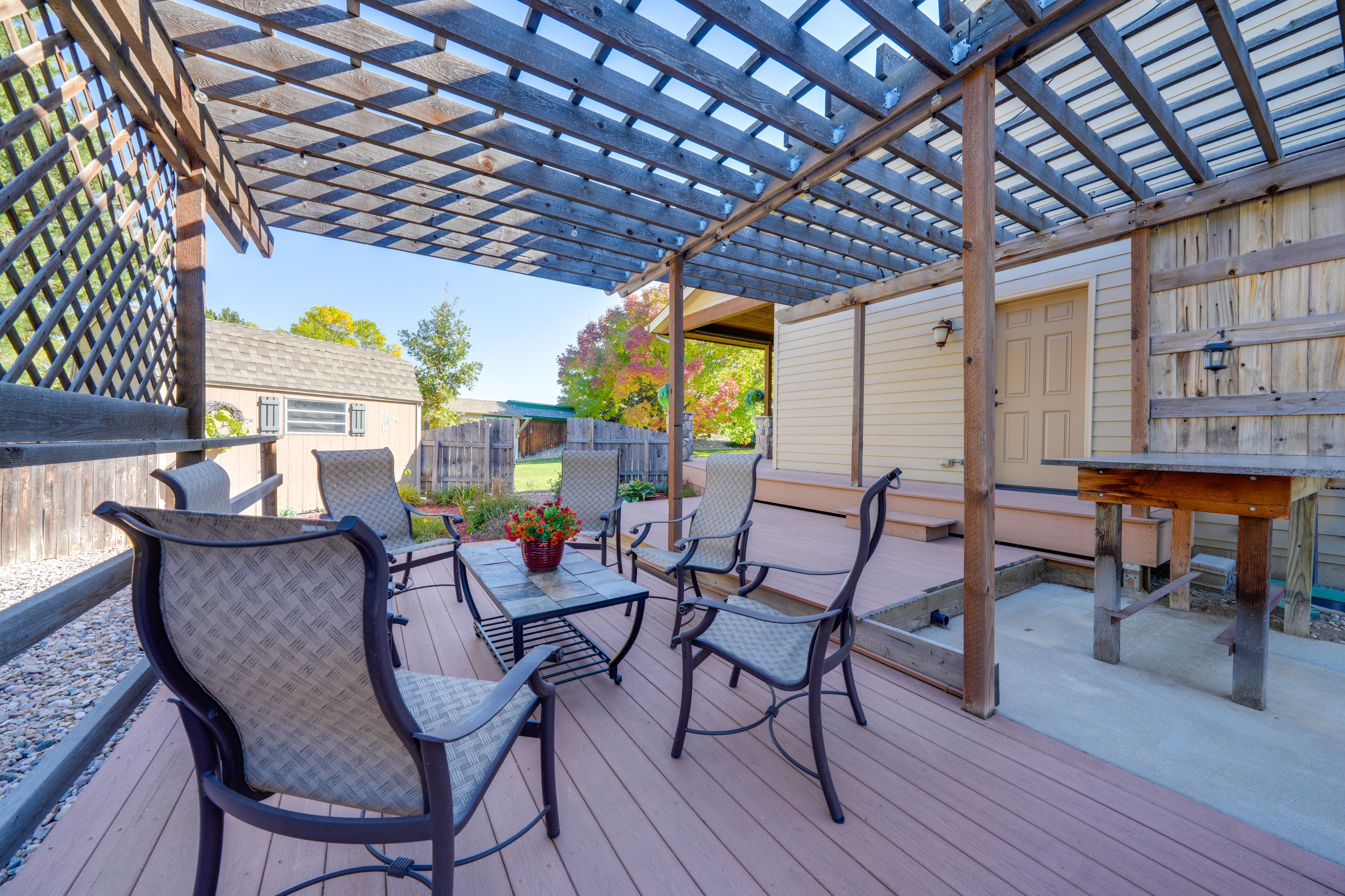 House Exterior | Furnished Deck w/ Pergola