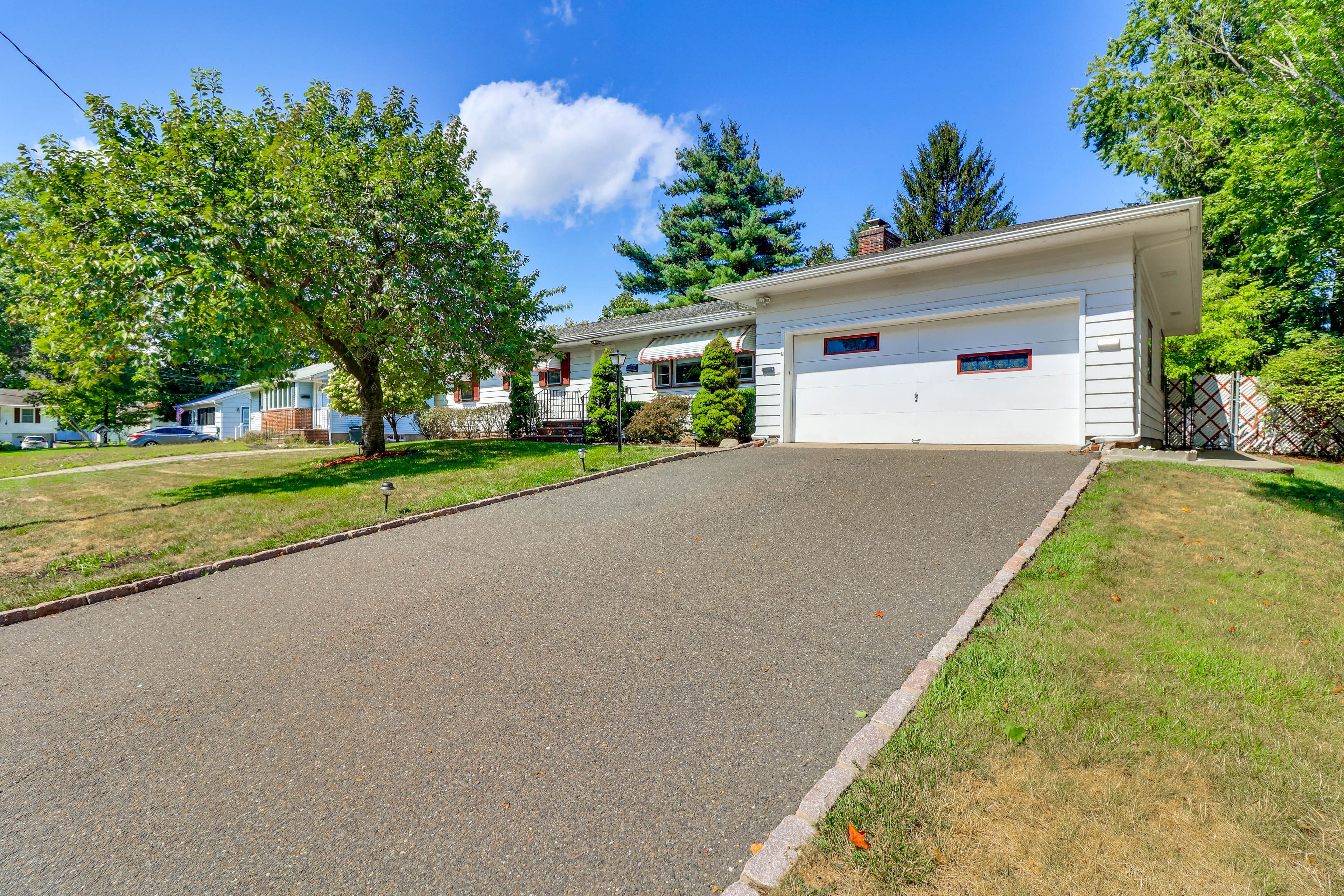 Exterior | Driveway (2 Vehicles) | Free Street Parking