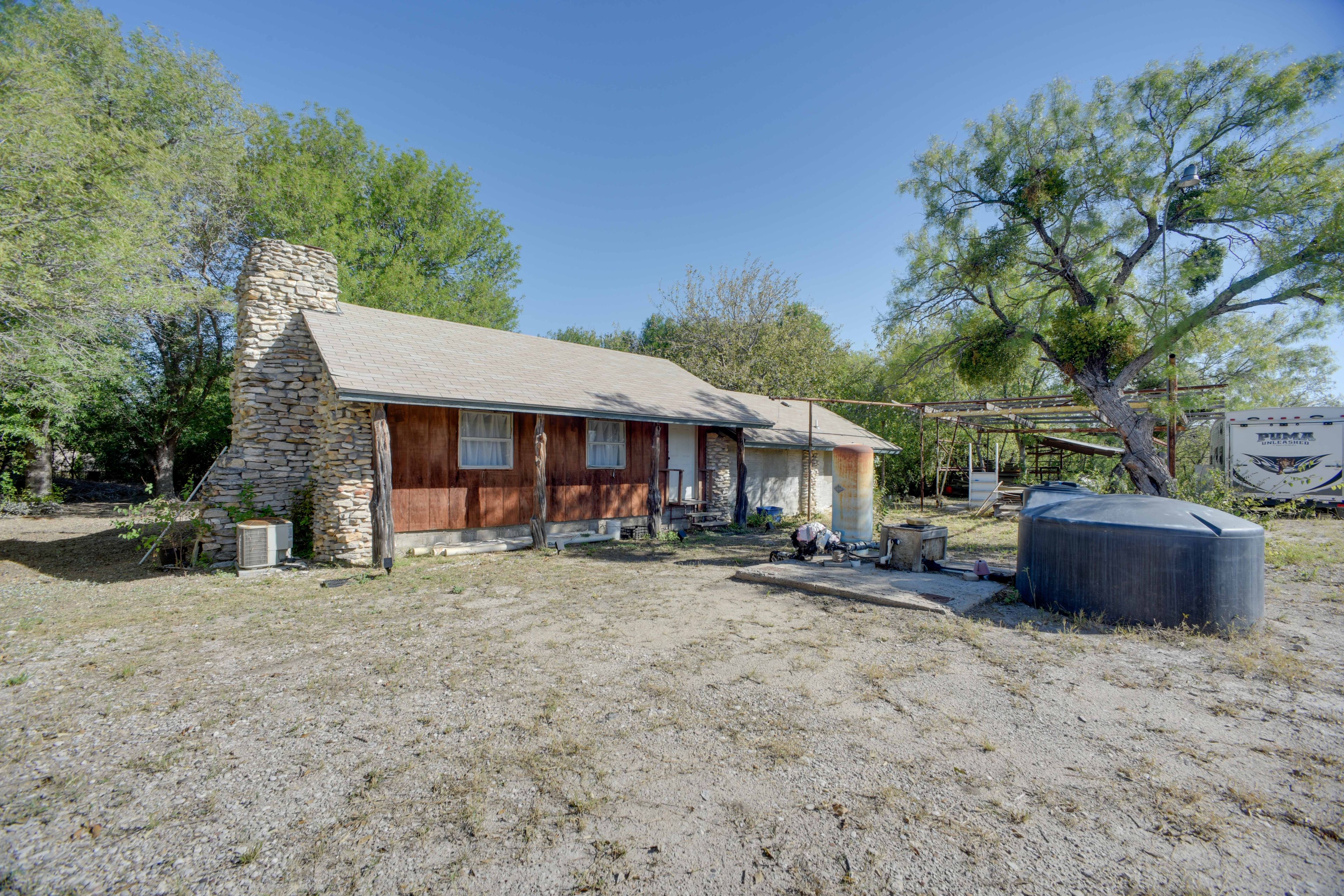Studio Exterior | Front Yard | Wood-Burning Fire Pit