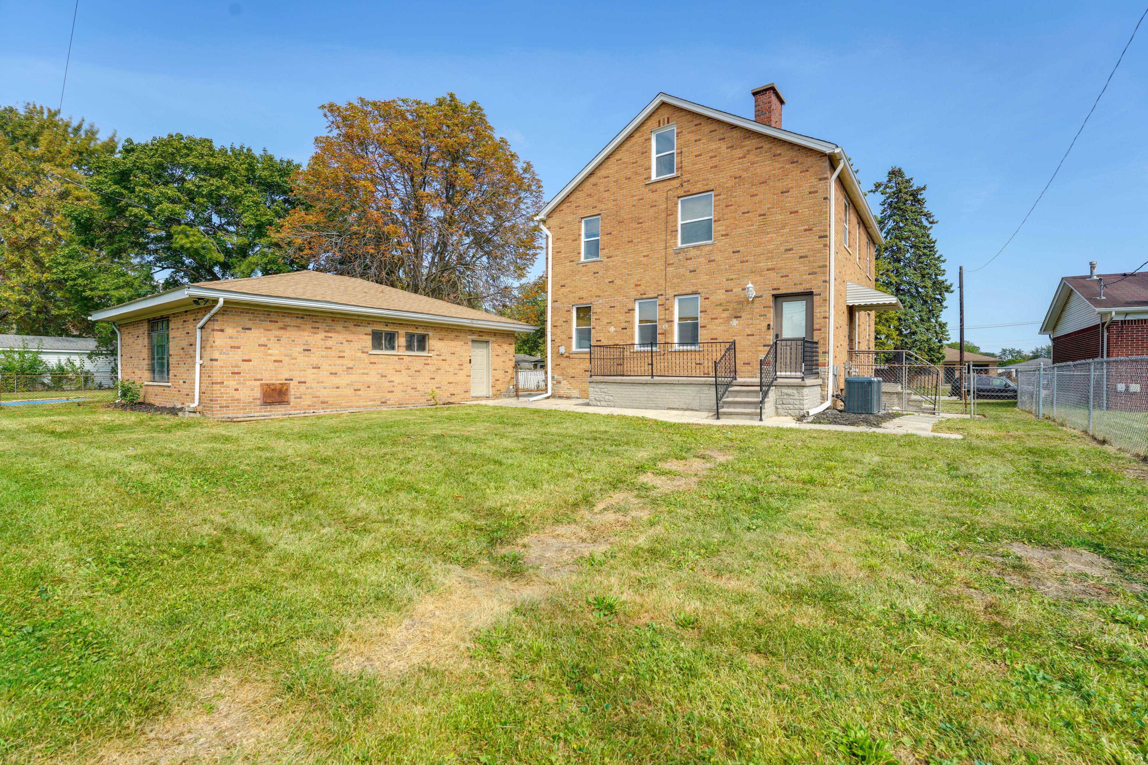 Duplex Exterior | Shared Fenced Yard