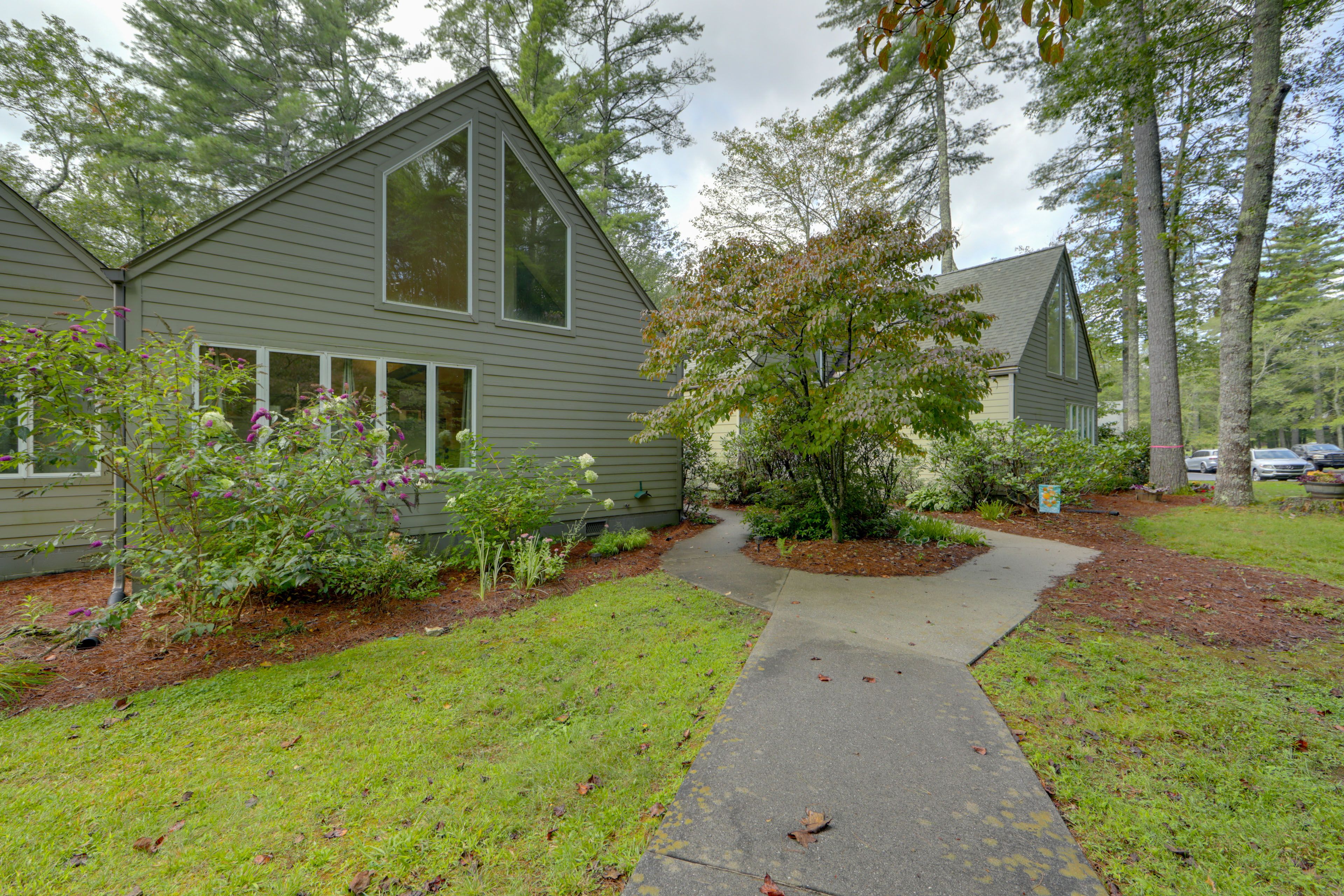 Property Exterior | Open Community Lot (First-Come, First-Served)