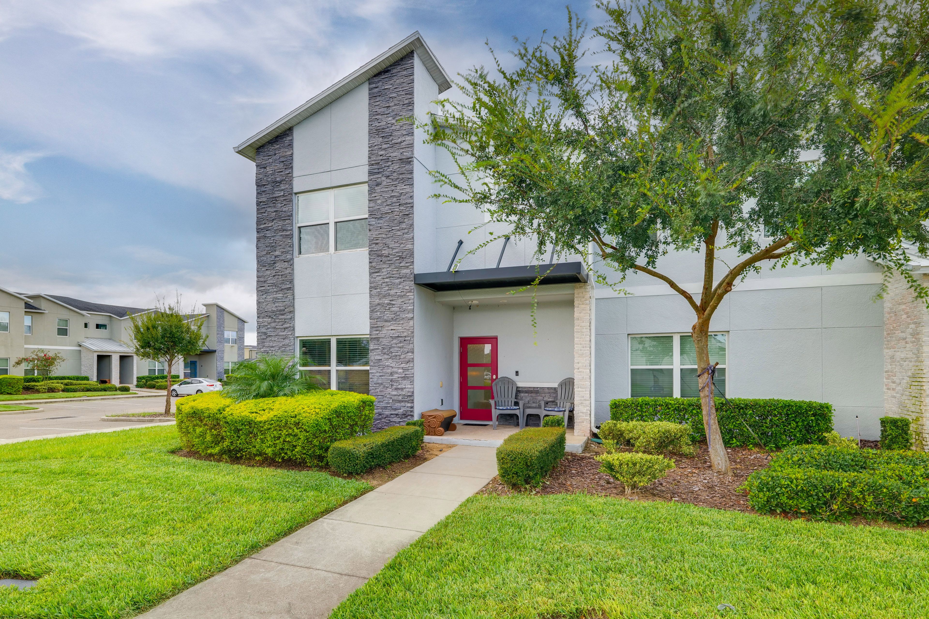 Townhome Exterior | Parking | Open Community Parking