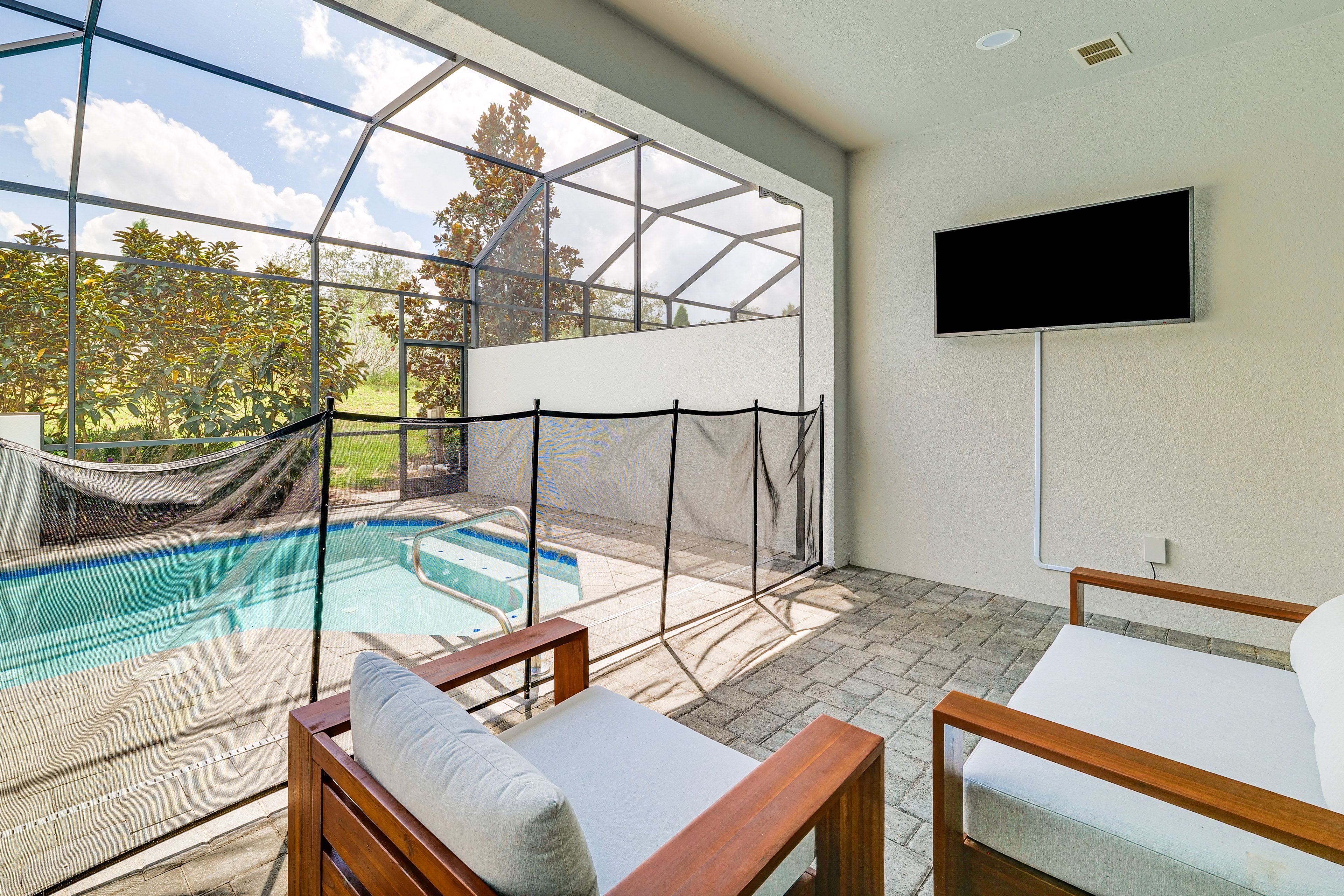 Lanai | Lounge Seating | Flat-Screen TV | Pool (Heated w/ Fee)
