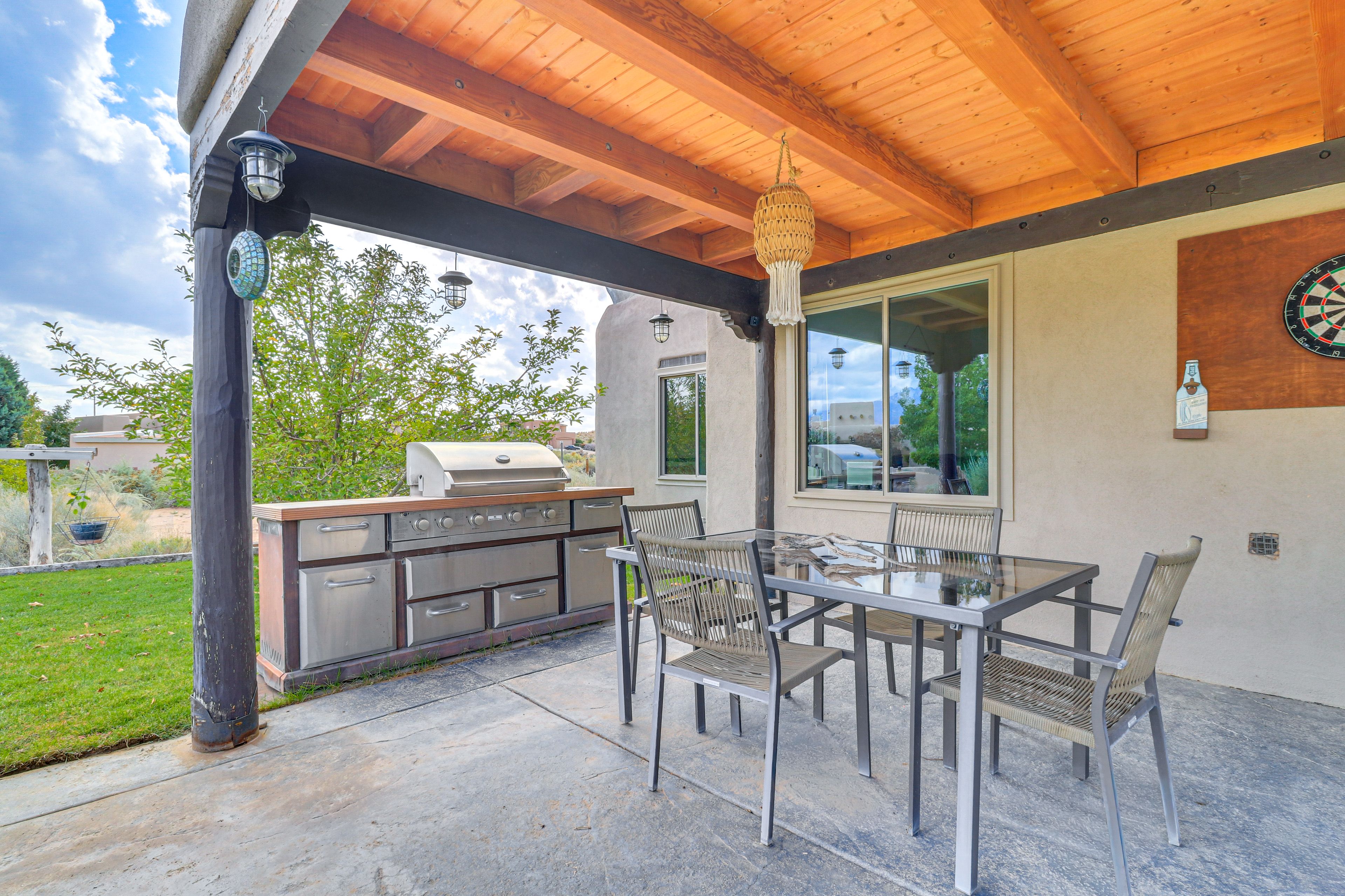 Rear Patio | Outdoor Dining | Gas Grill | Dartboard | Outdoor Fireplace