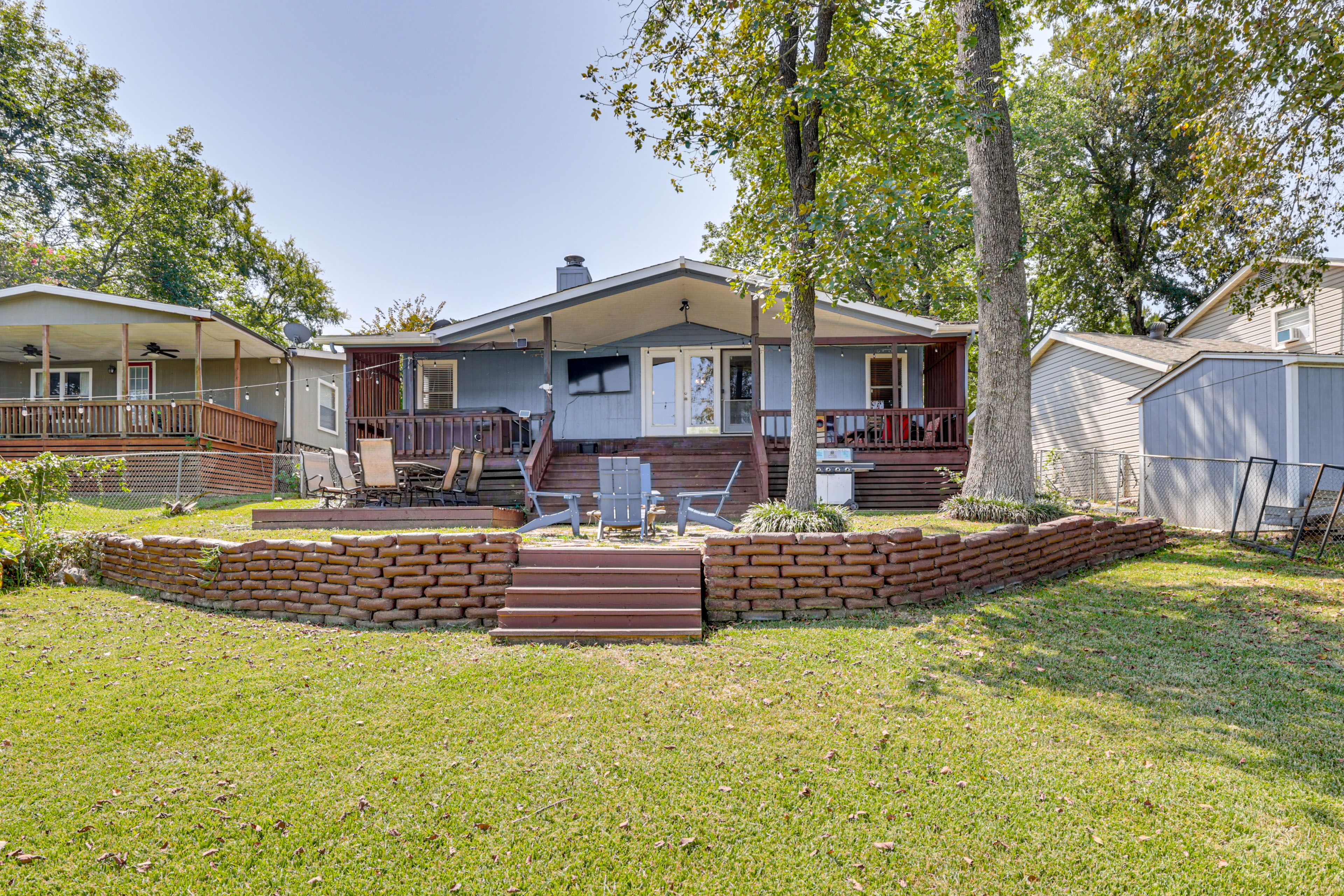 Property Exterior | Wood-Burning Fire Pit | Private Dock | Cornhole | Gas Grill