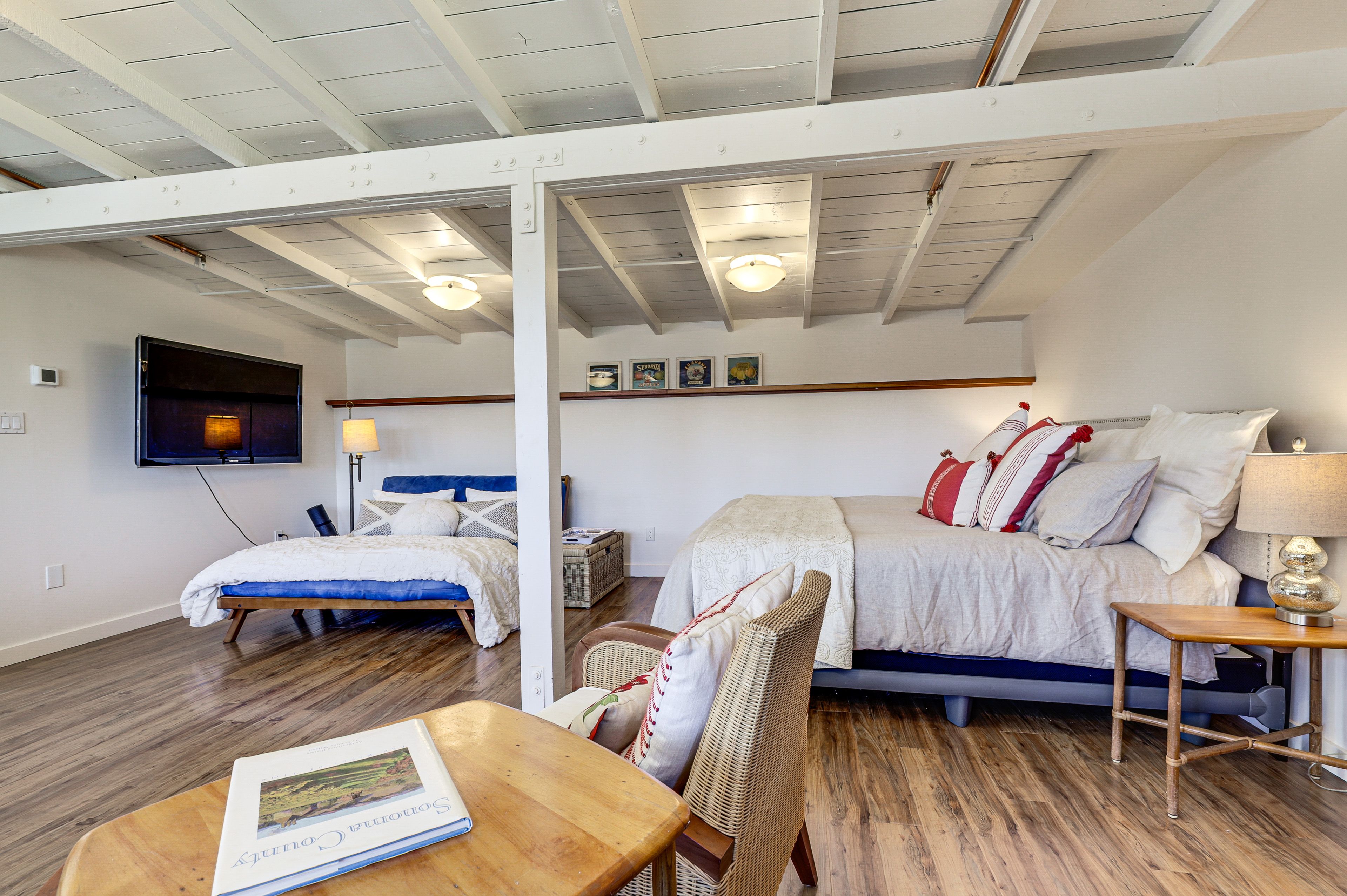 Studio | Sleeping/Living Area | King Bed | Queen Futon