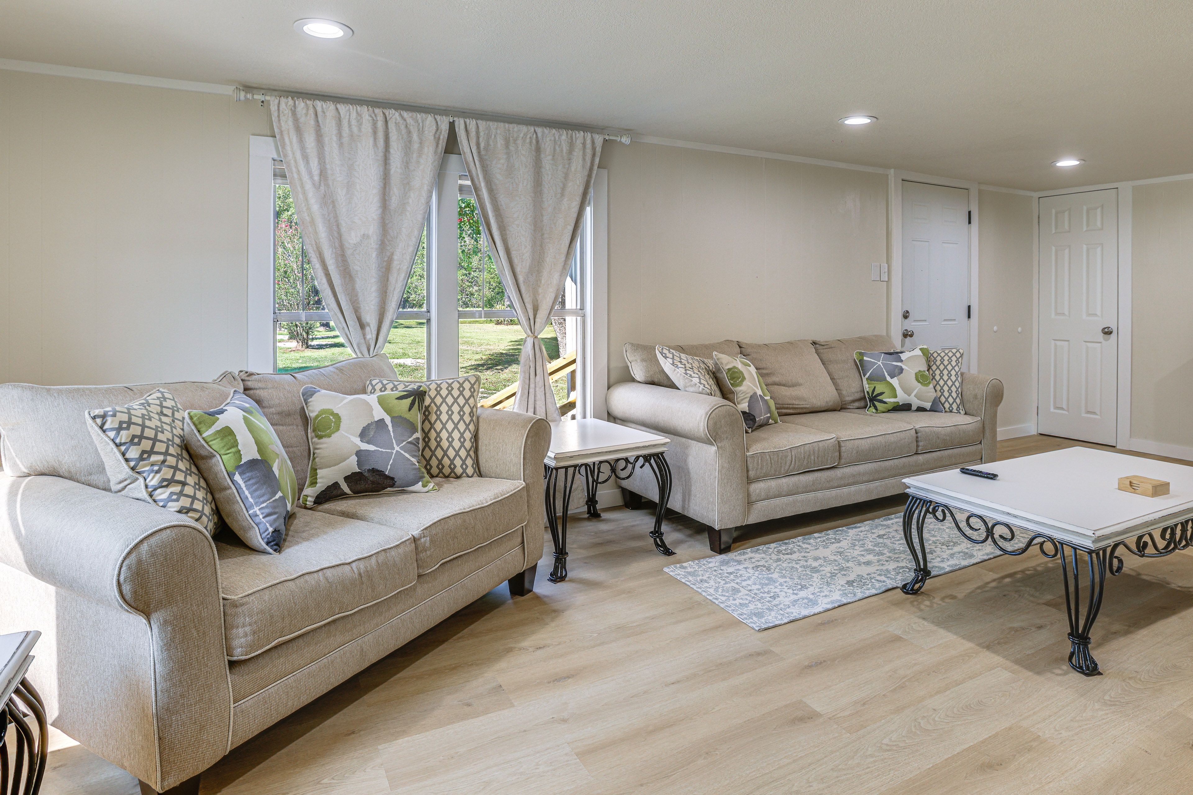 Living Room | Flat-Screen TV | Central Heating | Window A/C Units | Free WiFi