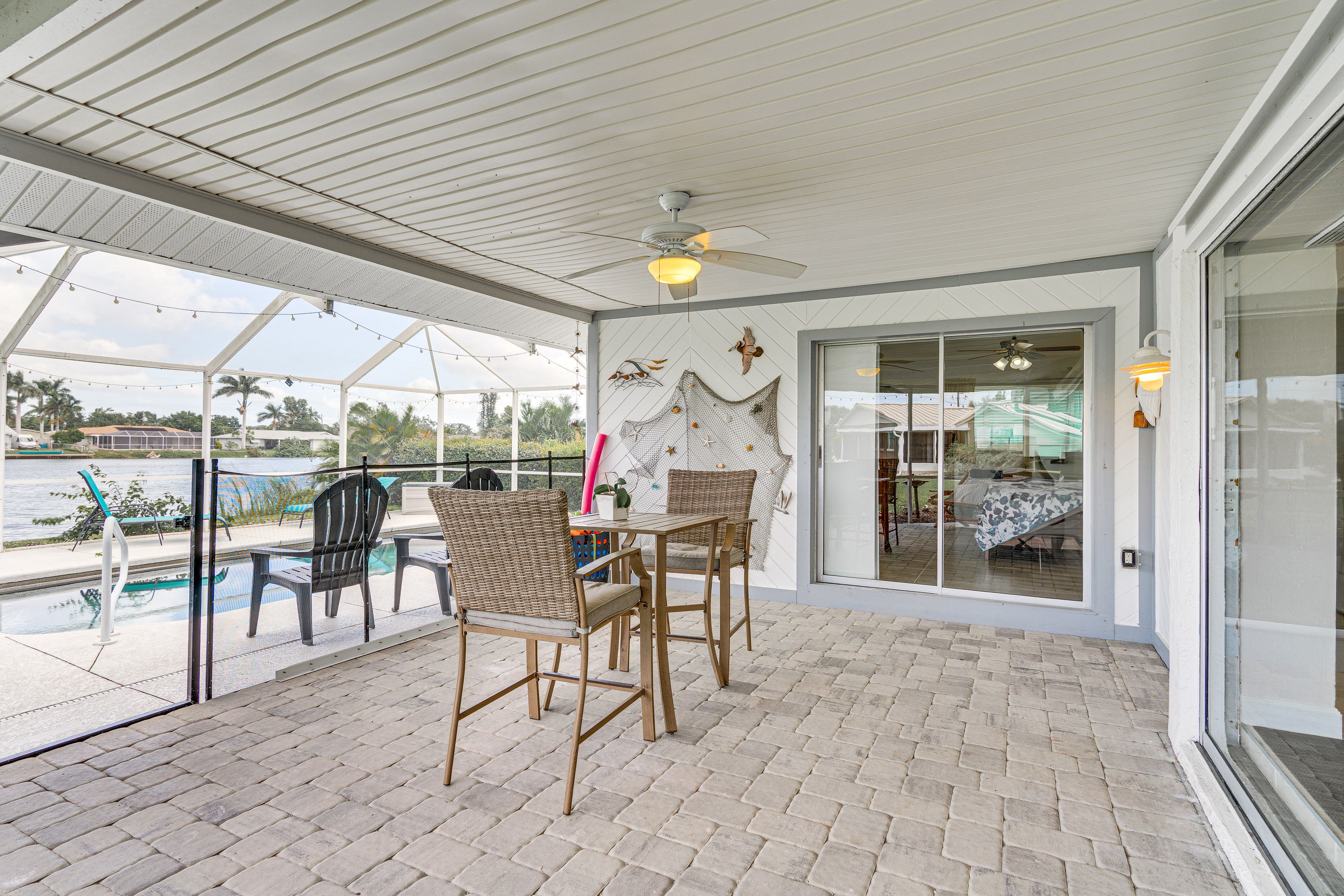 Covered Patio | Dining Area | Lake Views