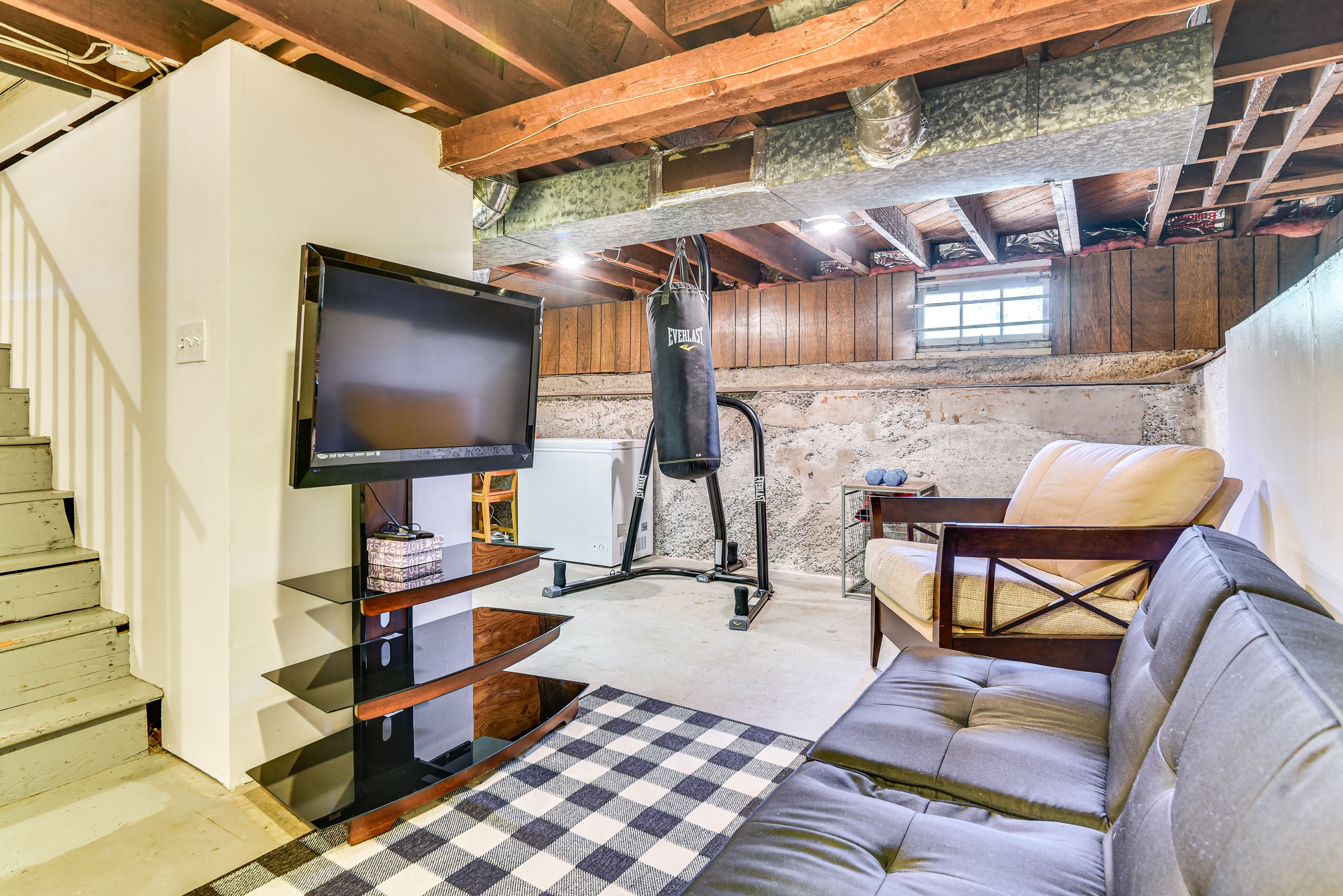 Bonus Living Area | Smart TV | Punching Bag | Weights | Lower Level