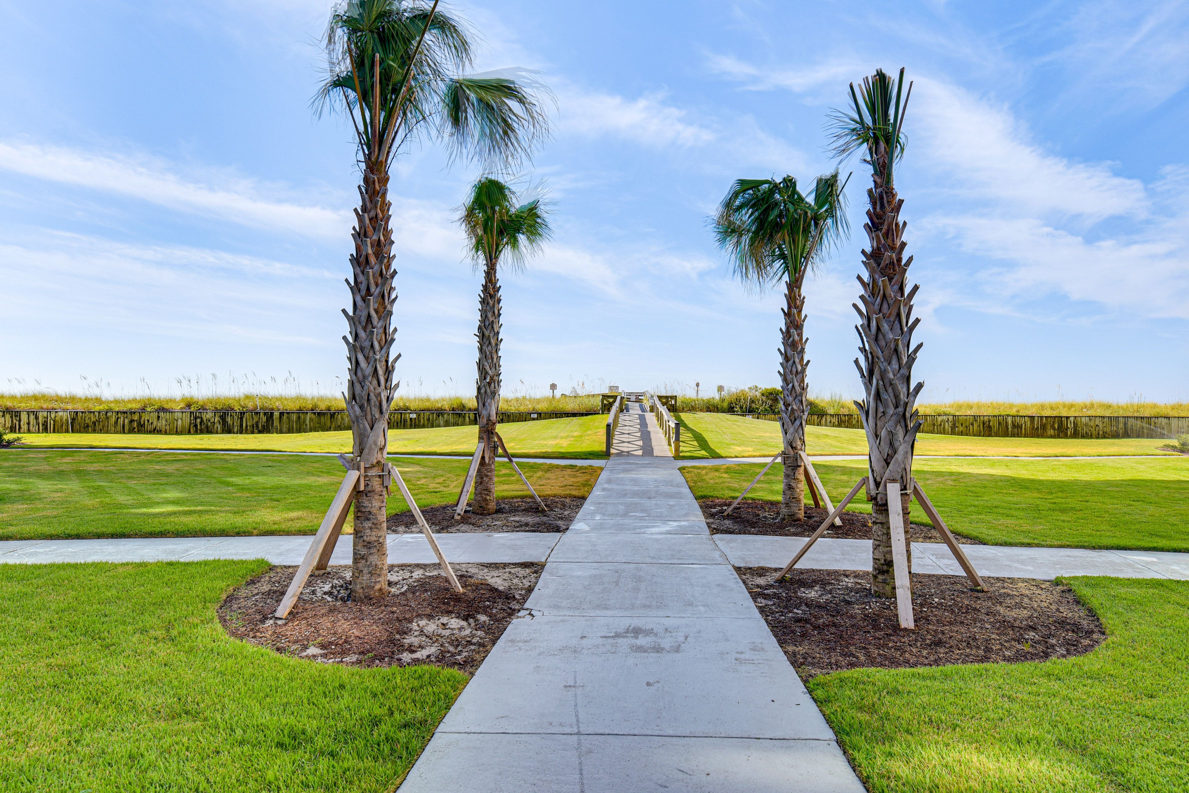 Condo Exterior | Steps to Public Beach