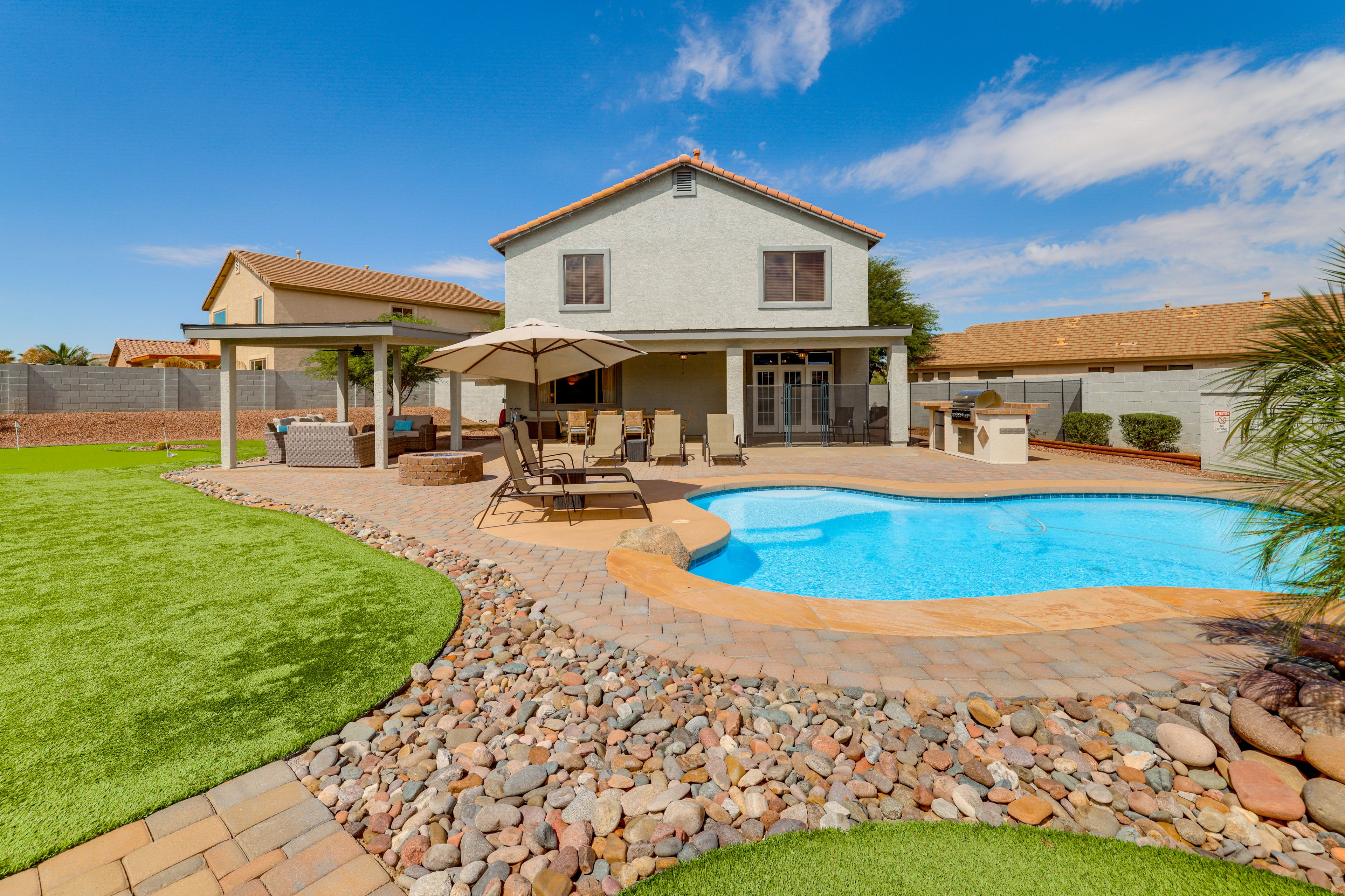 Goodyear Vacation Rental | 4BR | 3BA | 2,825 Sq Ft | Small Step to Enter