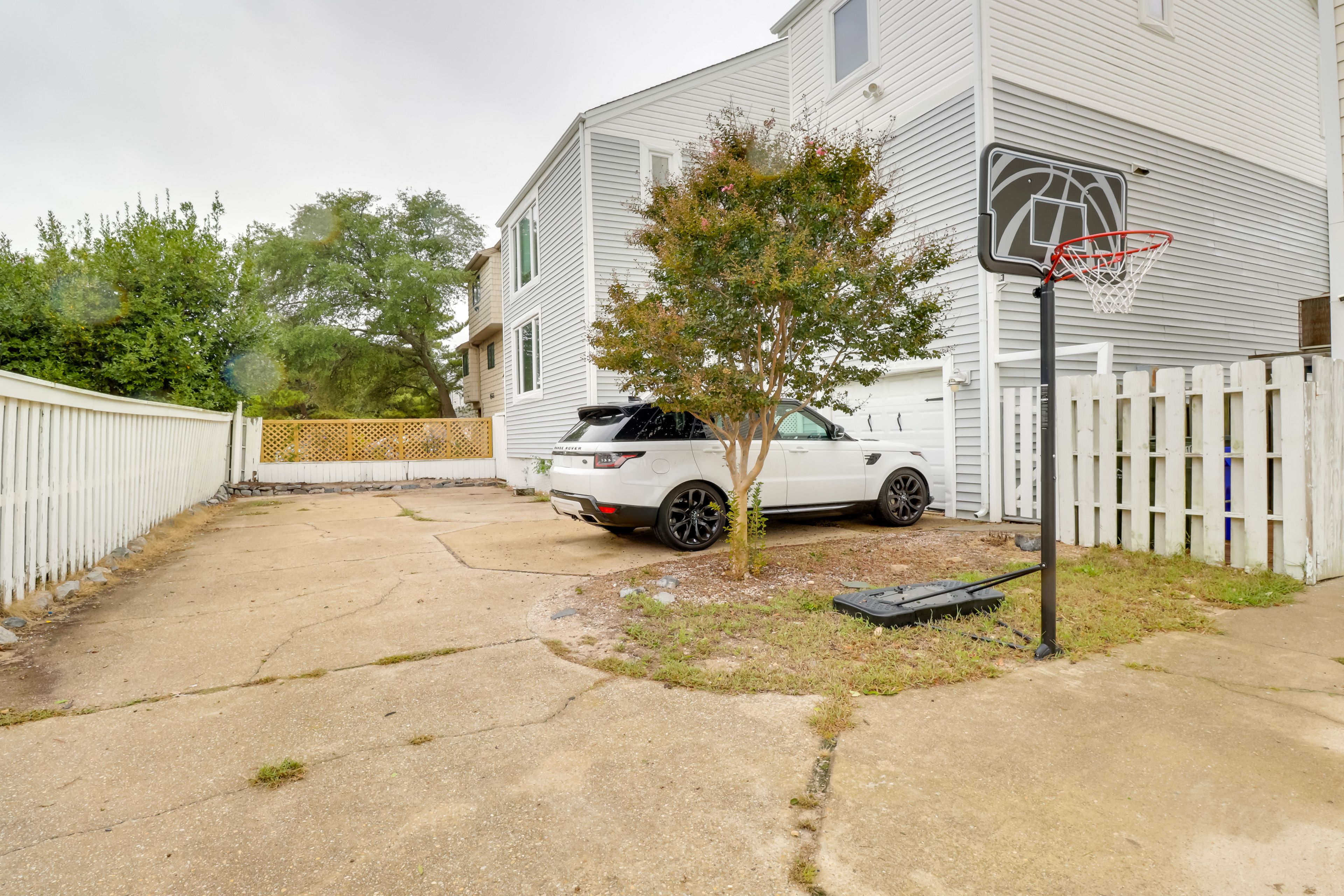Parking | Designated Area (4 Vehicles) | Driveway (1 Vehicle)