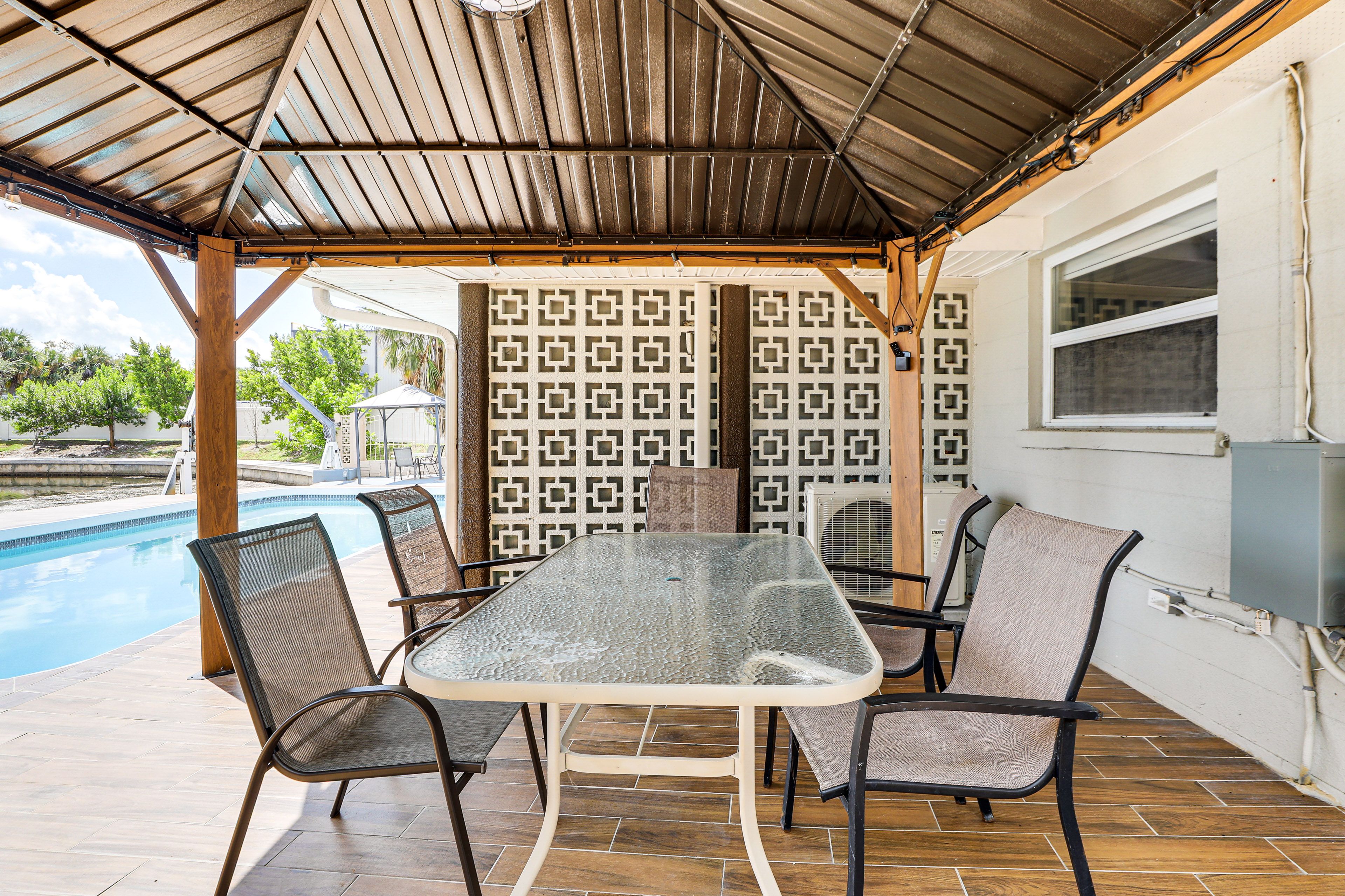 House Exterior | Covered Dining Area