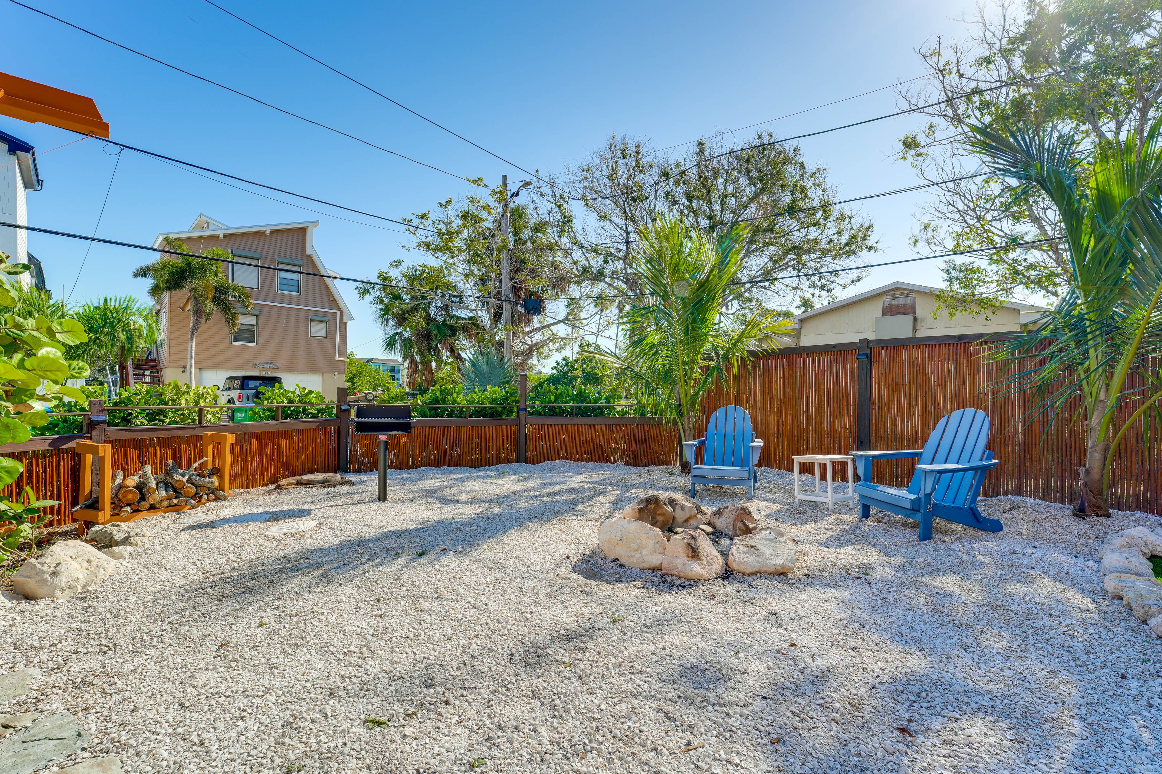 House Exterior | Wood-Burning Fire Pit | Charcoal Grill | Hammock | Fenced Yard